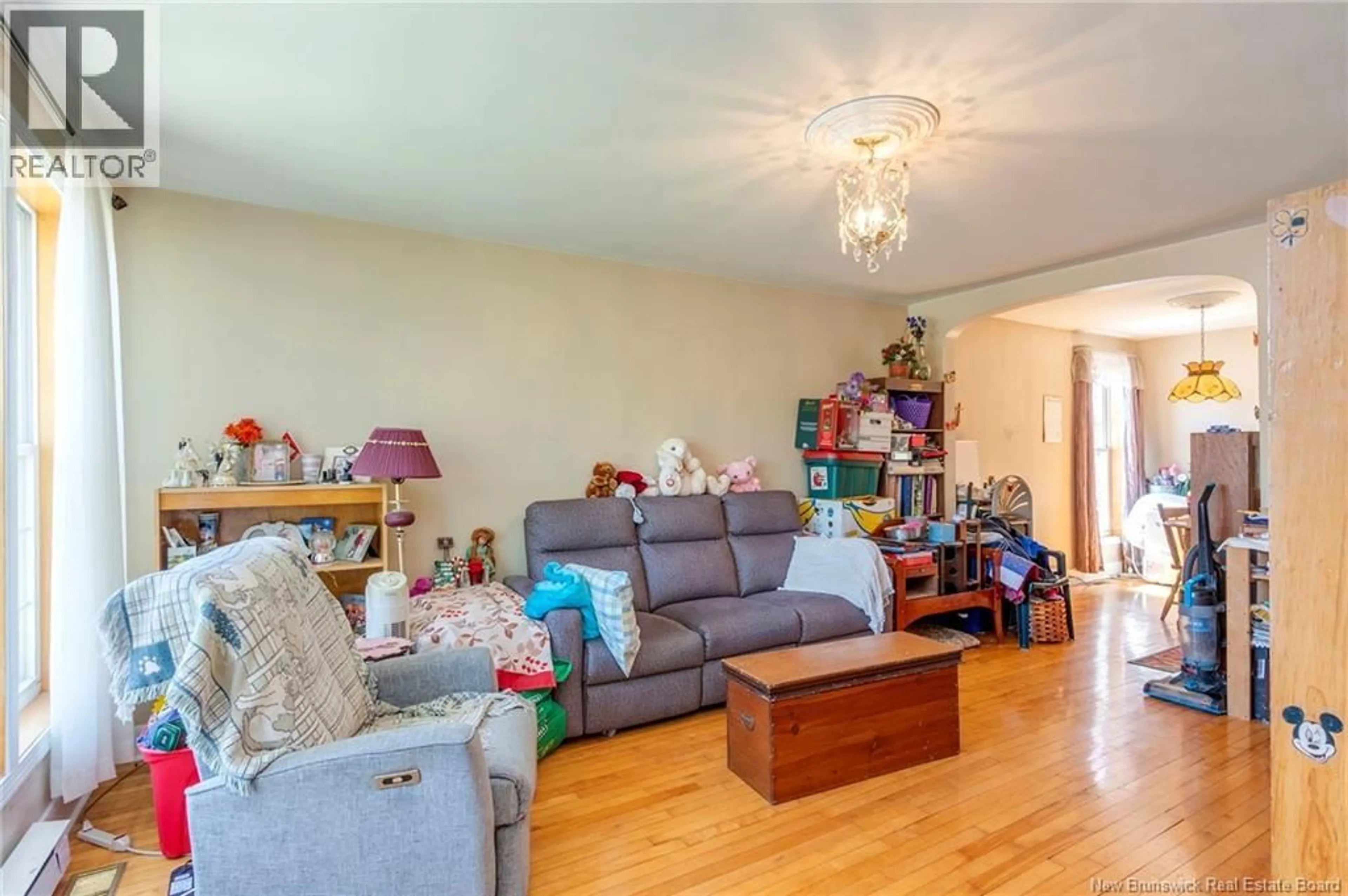 Living room with furniture, wood/laminate floor for 307 MAIN STREET, Sussex New Brunswick E4E1R7