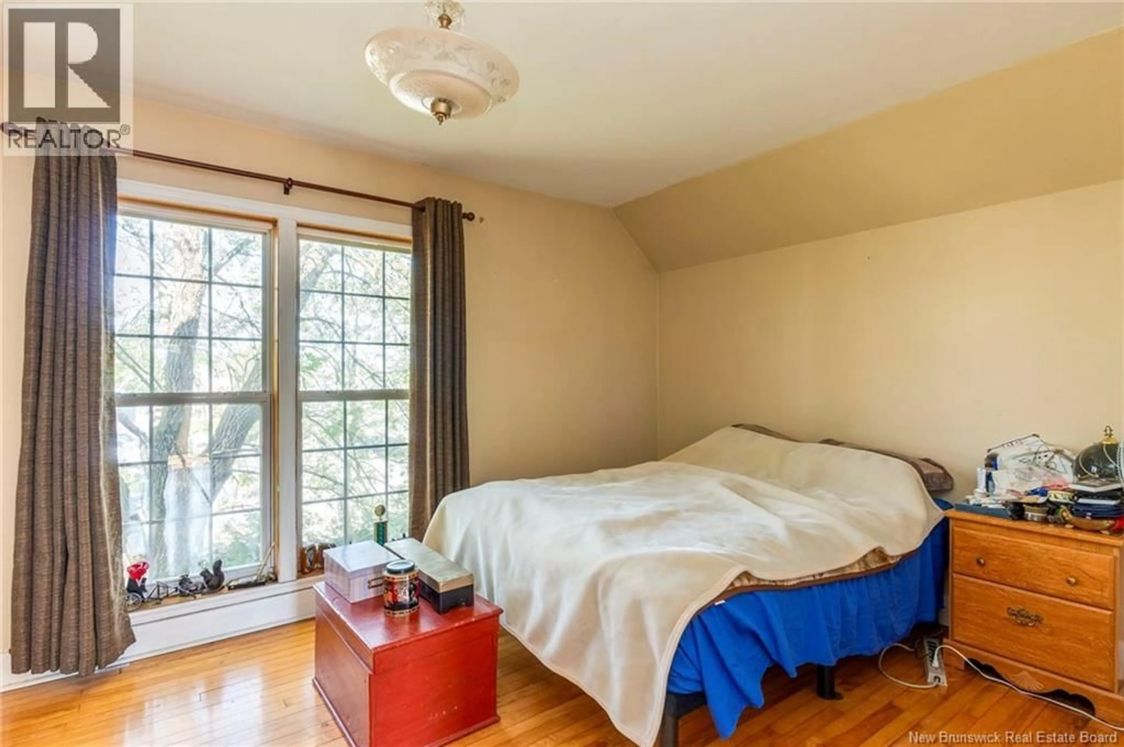 Bedroom with bed, wood/laminate floor for 307 MAIN STREET, Sussex New Brunswick E4E1R7