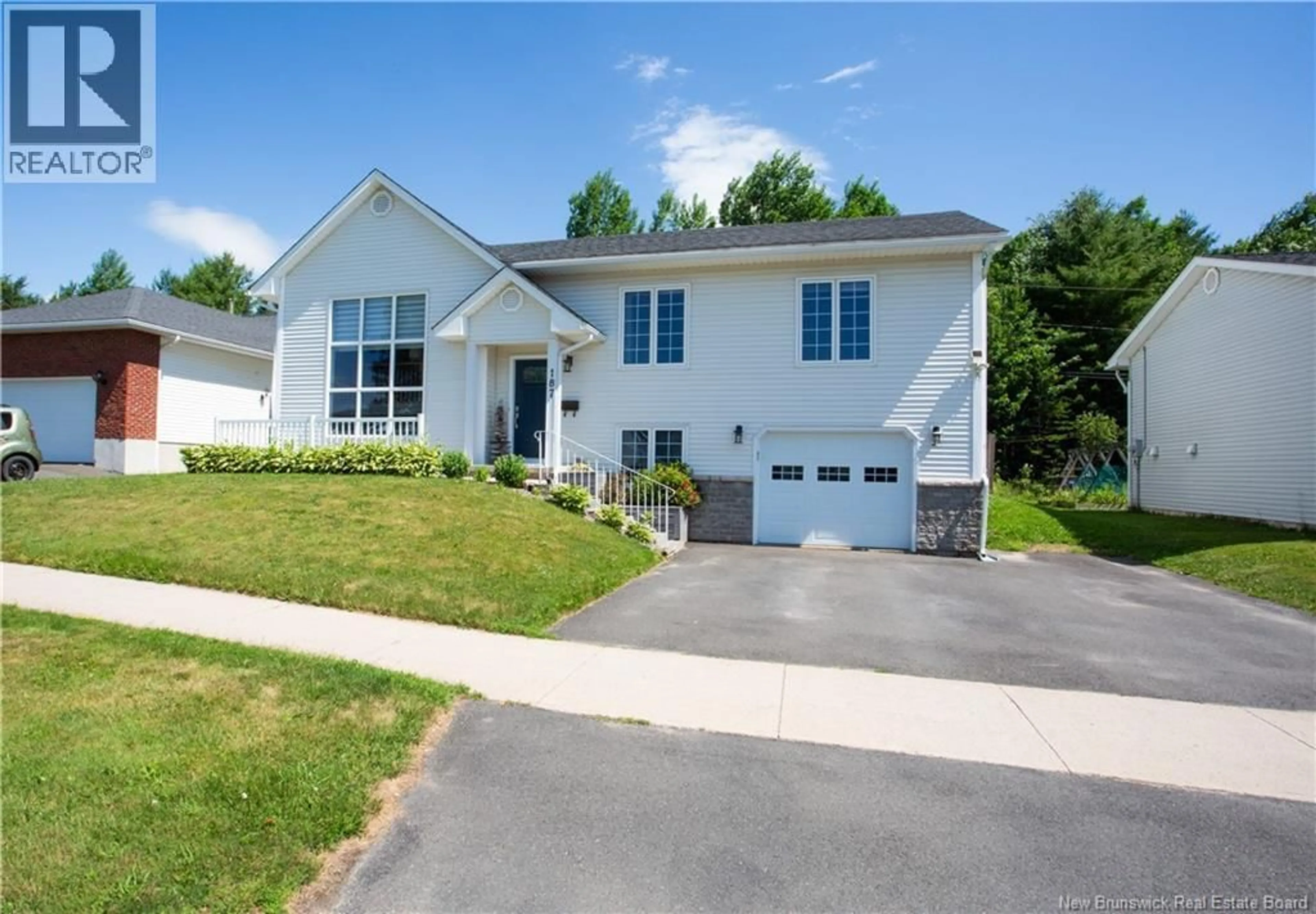 Home with vinyl exterior material, street for 187 MCKNIGHT STREET, Fredericton New Brunswick E3A5W4