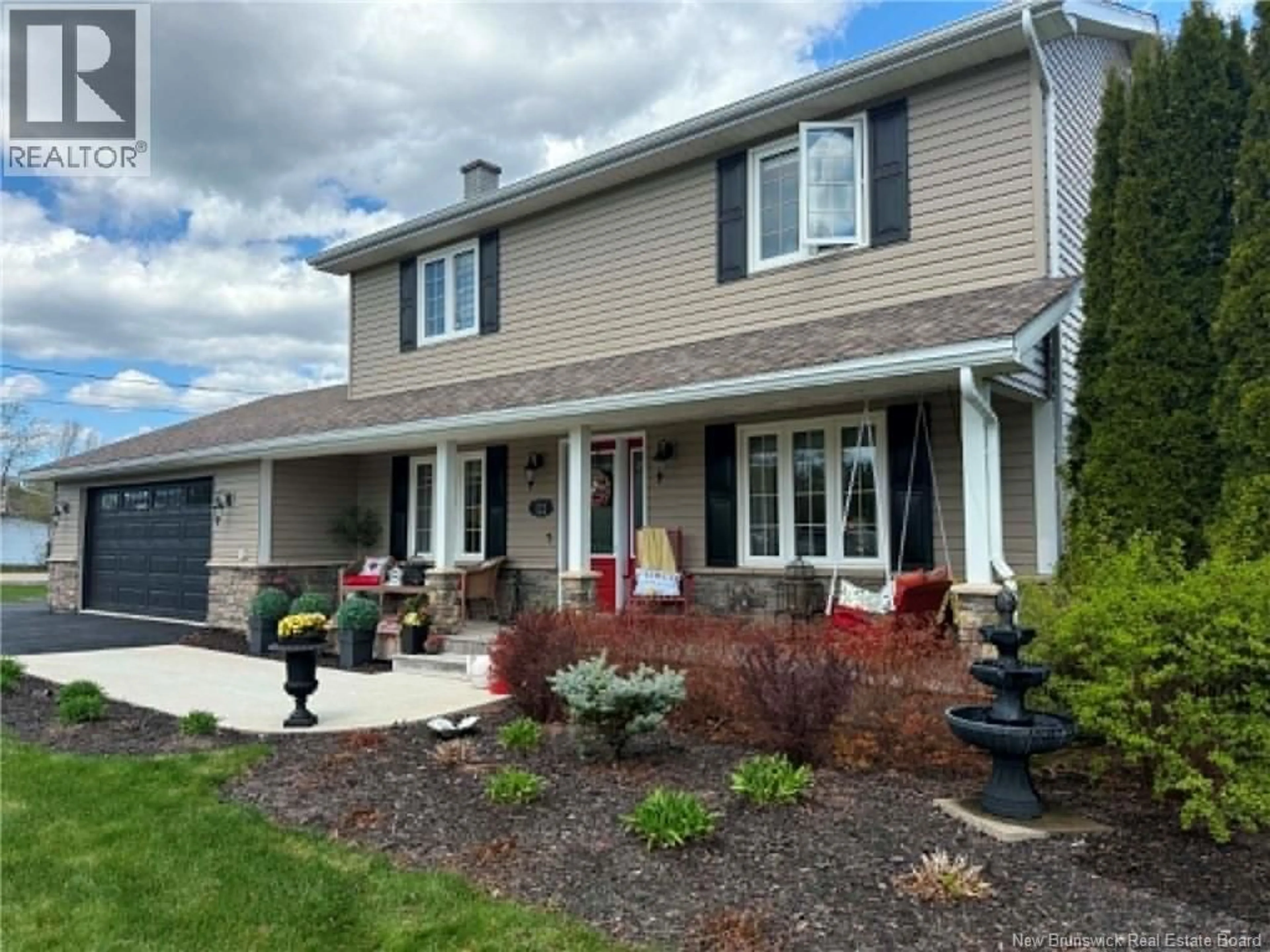 Home with vinyl exterior material, street for 122 KIERSTEAD DRIVE, Miramichi New Brunswick E1V6R7