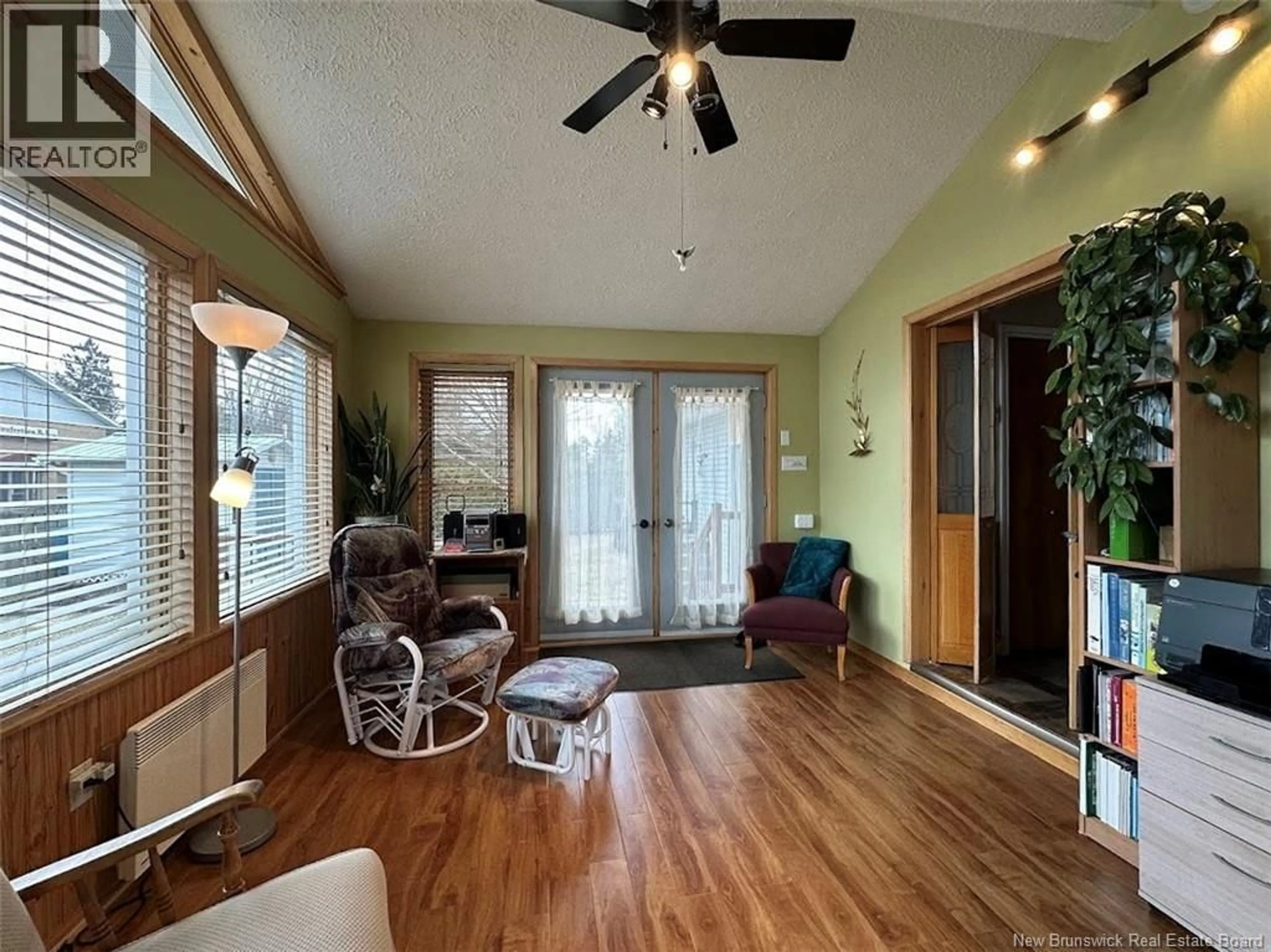 Living room with furniture, wood/laminate floor for 685 PRINCIPALE STREET, Clair New Brunswick E7A2H3