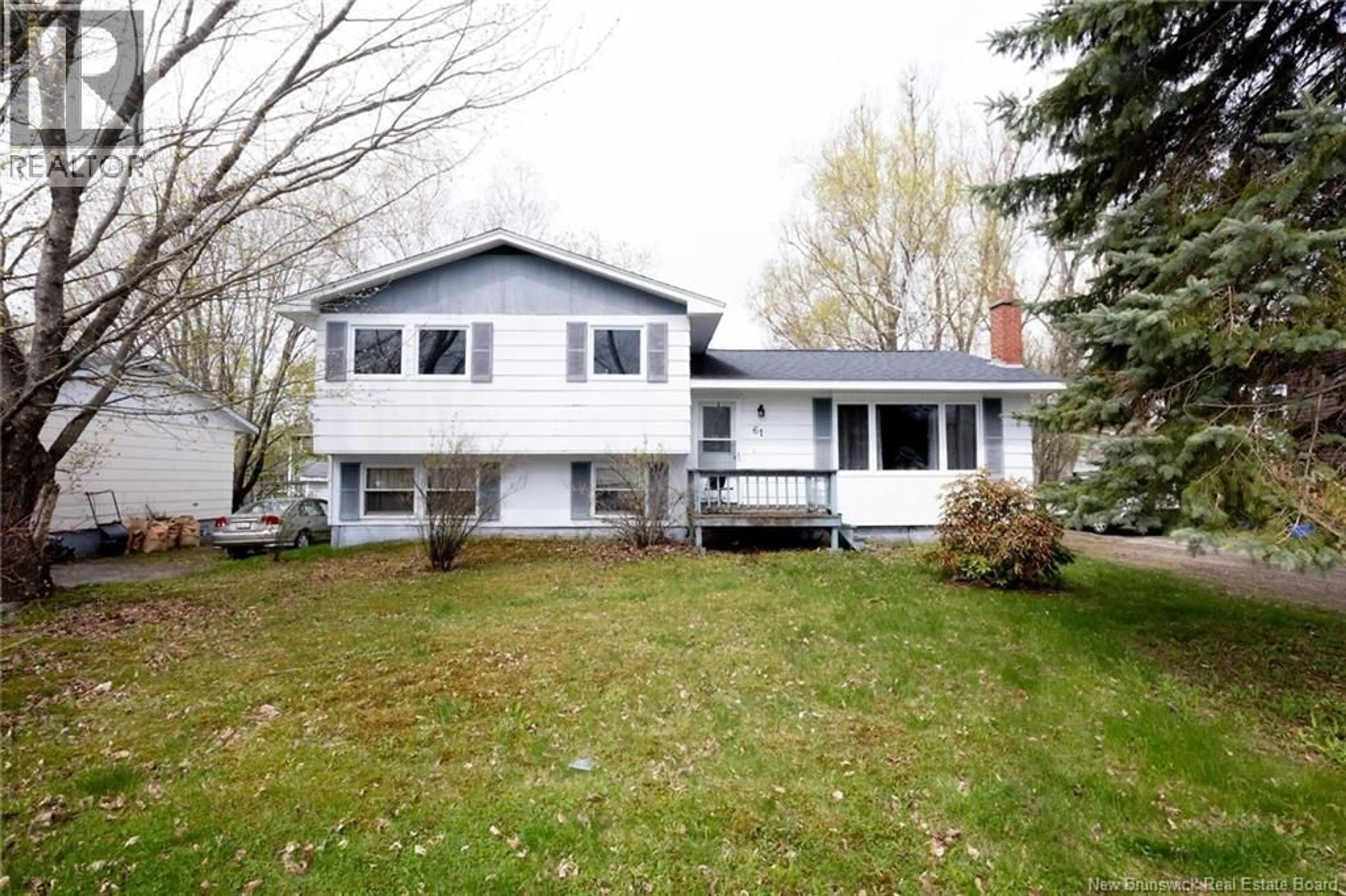 Home with vinyl exterior material, street for 61 BATES STREET, Fredericton New Brunswick E3A5B7