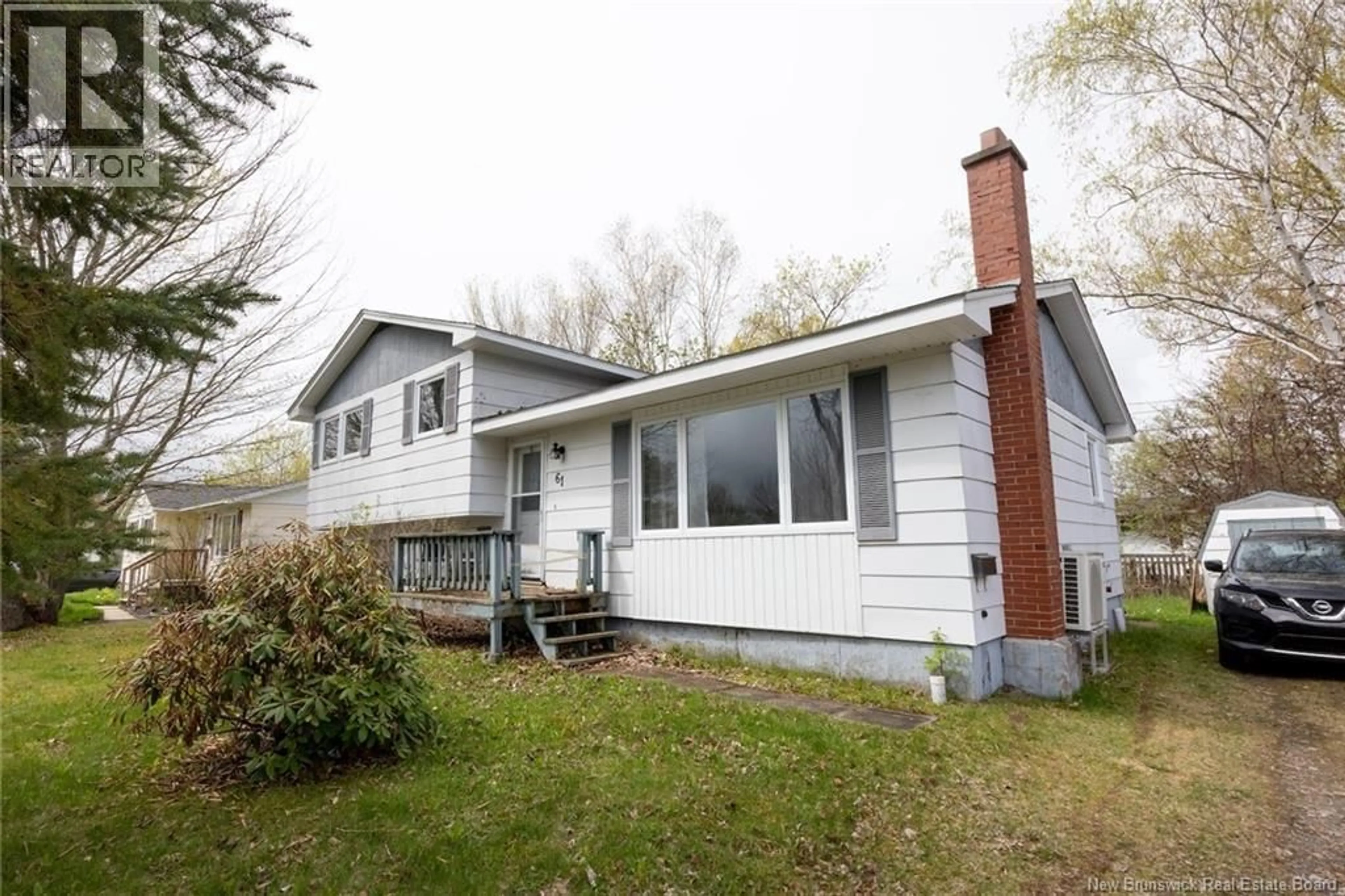 Home with vinyl exterior material, street for 61 BATES STREET, Fredericton New Brunswick E3A5B7