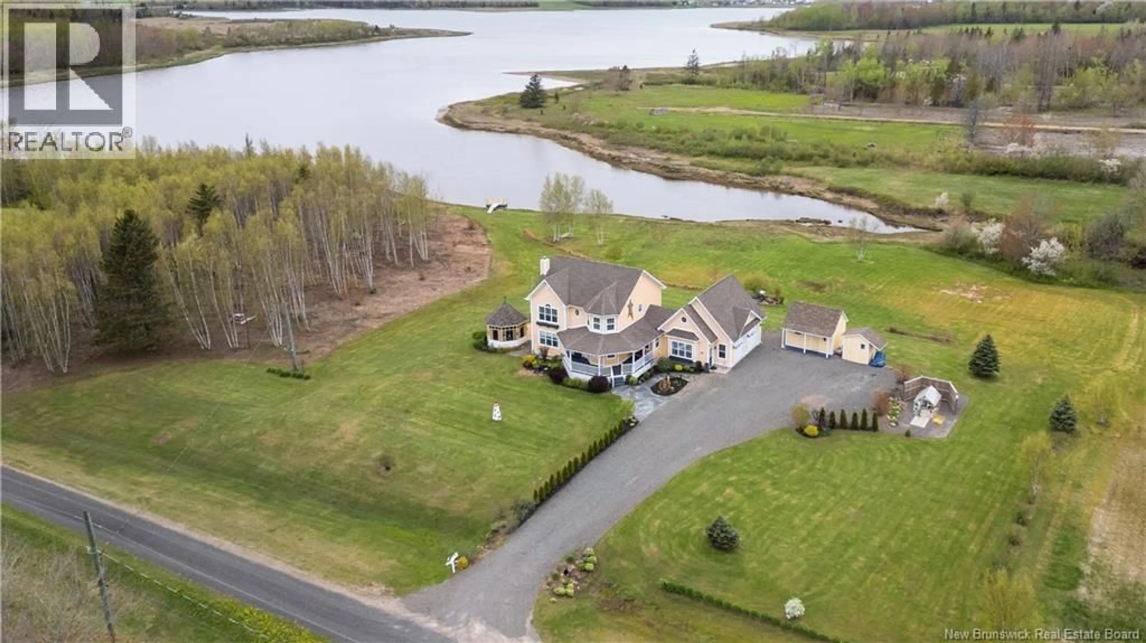 A pic from outside/outdoor area/front of a property/back of a property/a pic from drone, water/lake/river/ocean view for 28 RYAN LANE, Grand-Barachois New Brunswick E4P7M9