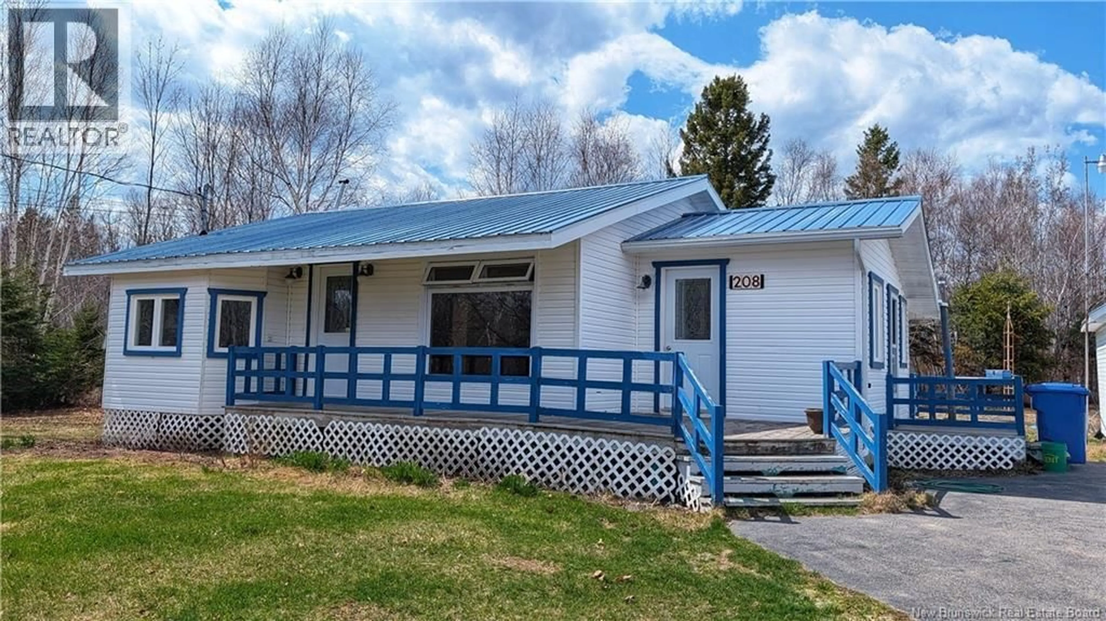 Home with vinyl exterior material, street for 208 BD DES ACADIENS, Bertrand New Brunswick E1W1C4