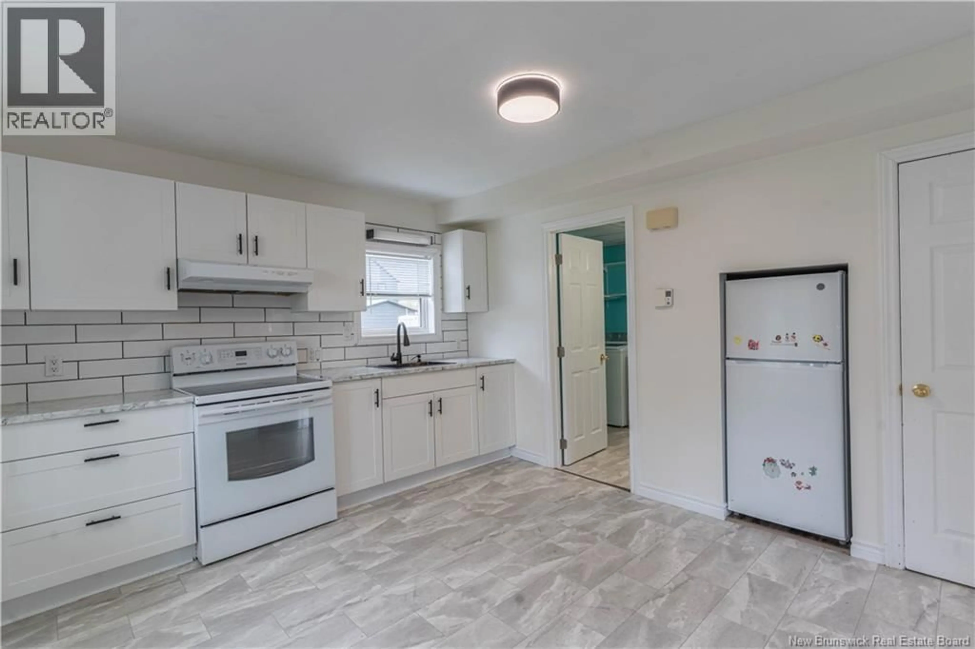 Standard kitchen, ceramic/tile floor for 37 RUE CENTRALE, Rogersville New Brunswick E4Y2G6