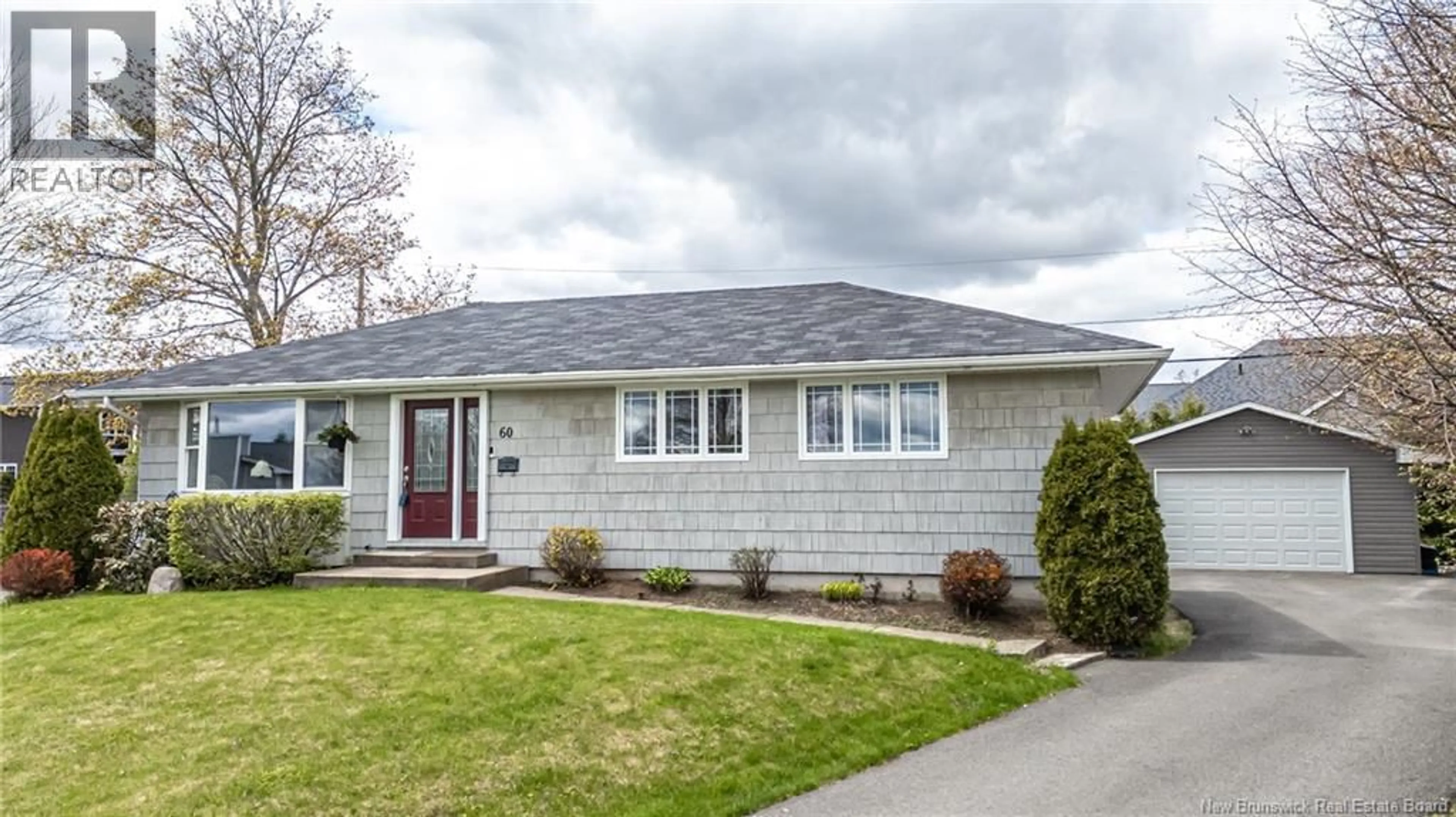 Home with vinyl exterior material, street for 60 DOYLE COURT, Fredericton New Brunswick E3B5T3