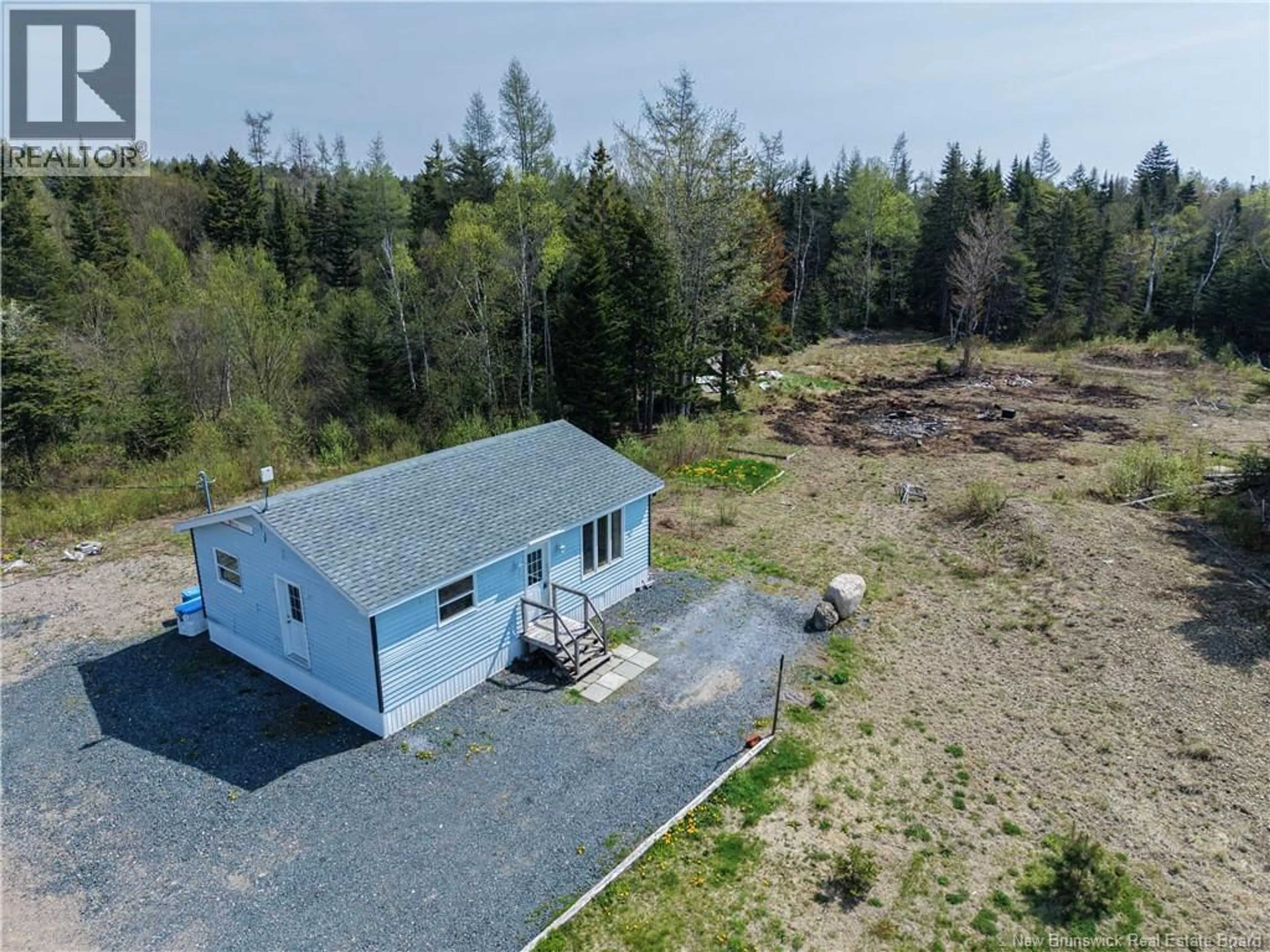 A pic from outside/outdoor area/front of a property/back of a property/a pic from drone, unknown for 653 ROUTE 175, Pennfield New Brunswick E5H0B5