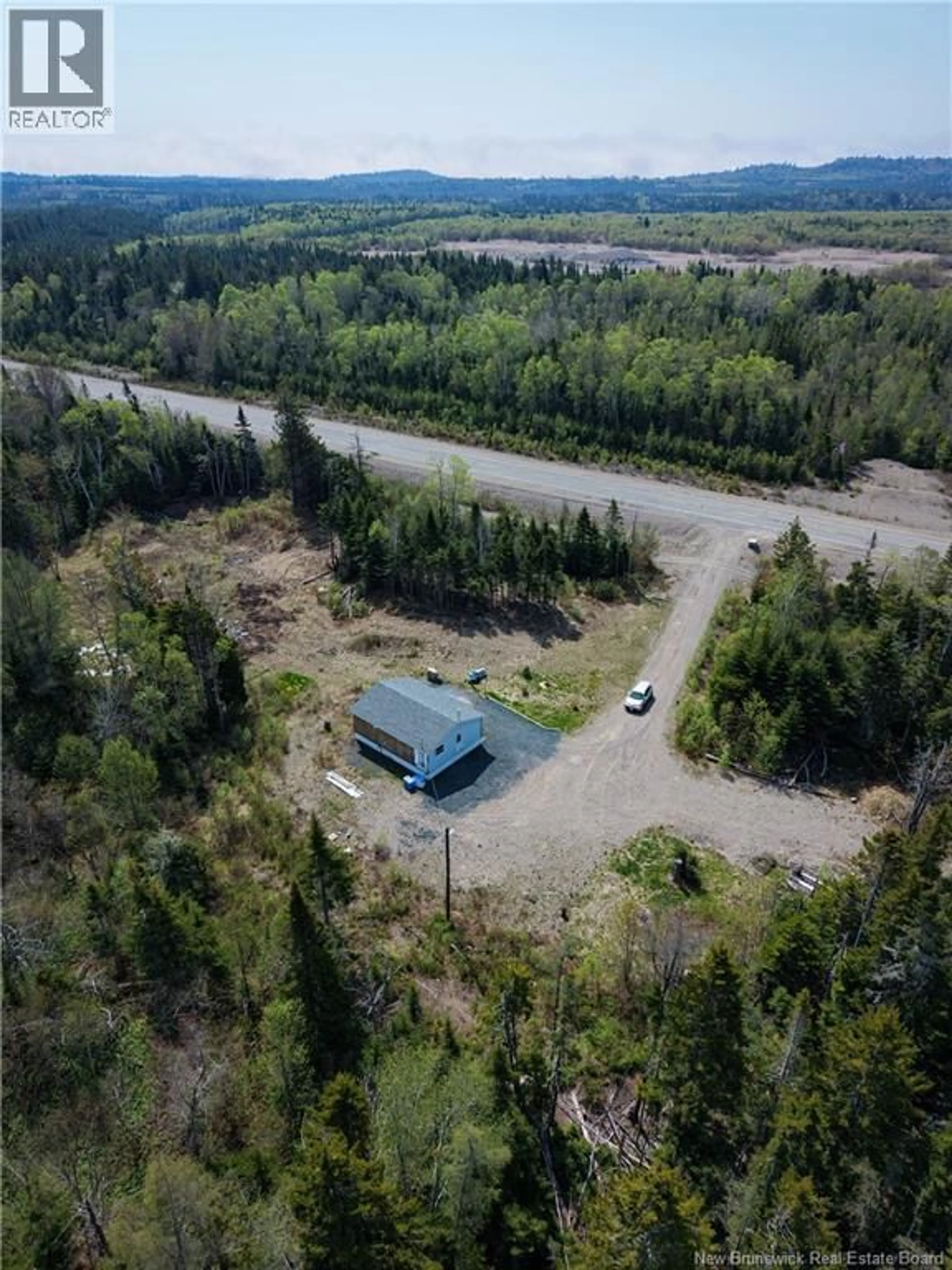 A pic from outside/outdoor area/front of a property/back of a property/a pic from drone, water/lake/river/ocean view for 653 ROUTE 175, Pennfield New Brunswick E5H0B5