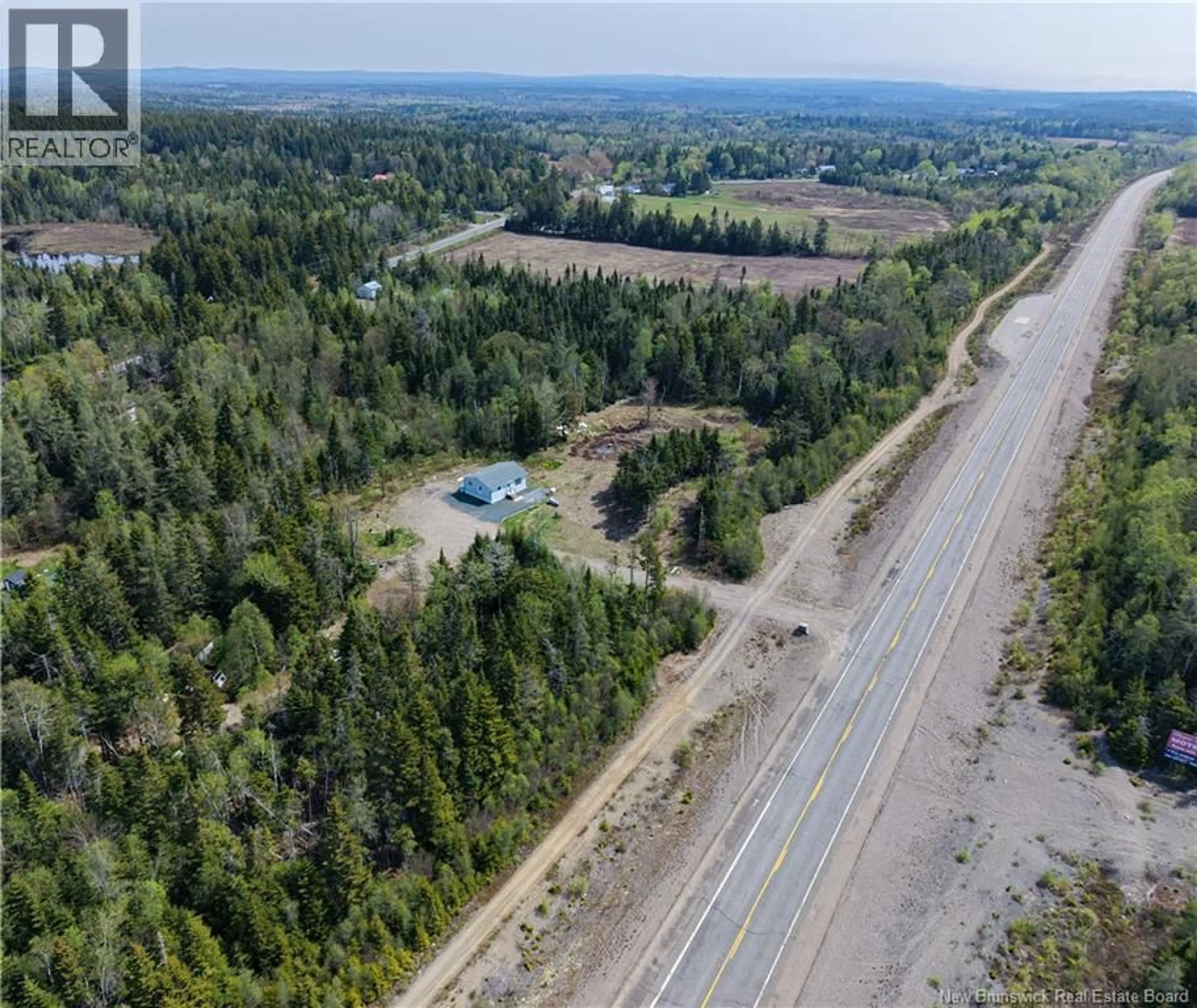 A pic from outside/outdoor area/front of a property/back of a property/a pic from drone, forest/trees view for 653 ROUTE 175, Pennfield New Brunswick E5H0B5