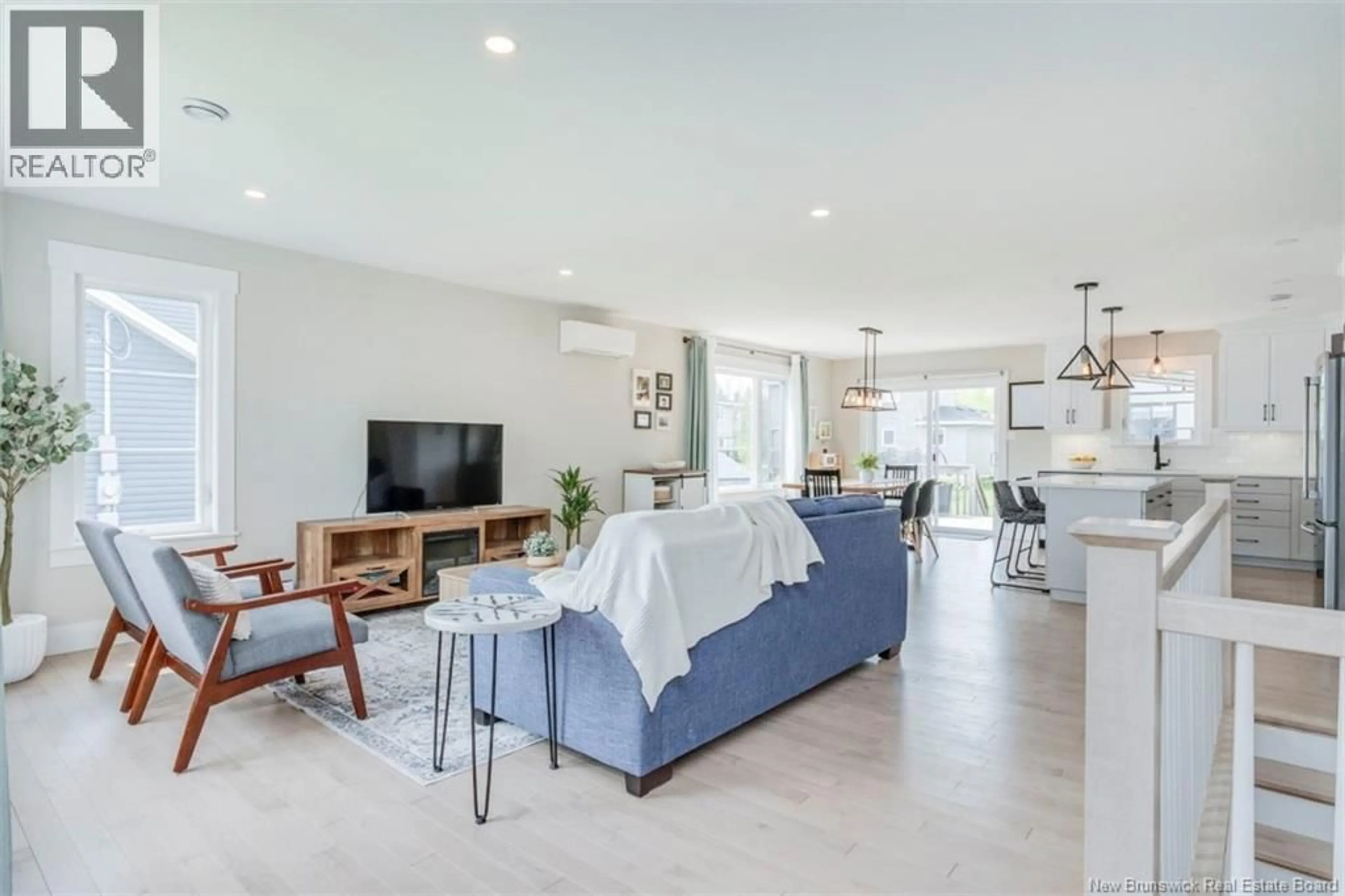 Living room with furniture, ceramic/tile floor for 16 PEBBLE CREEK WAY, Moncton New Brunswick E1E0C8