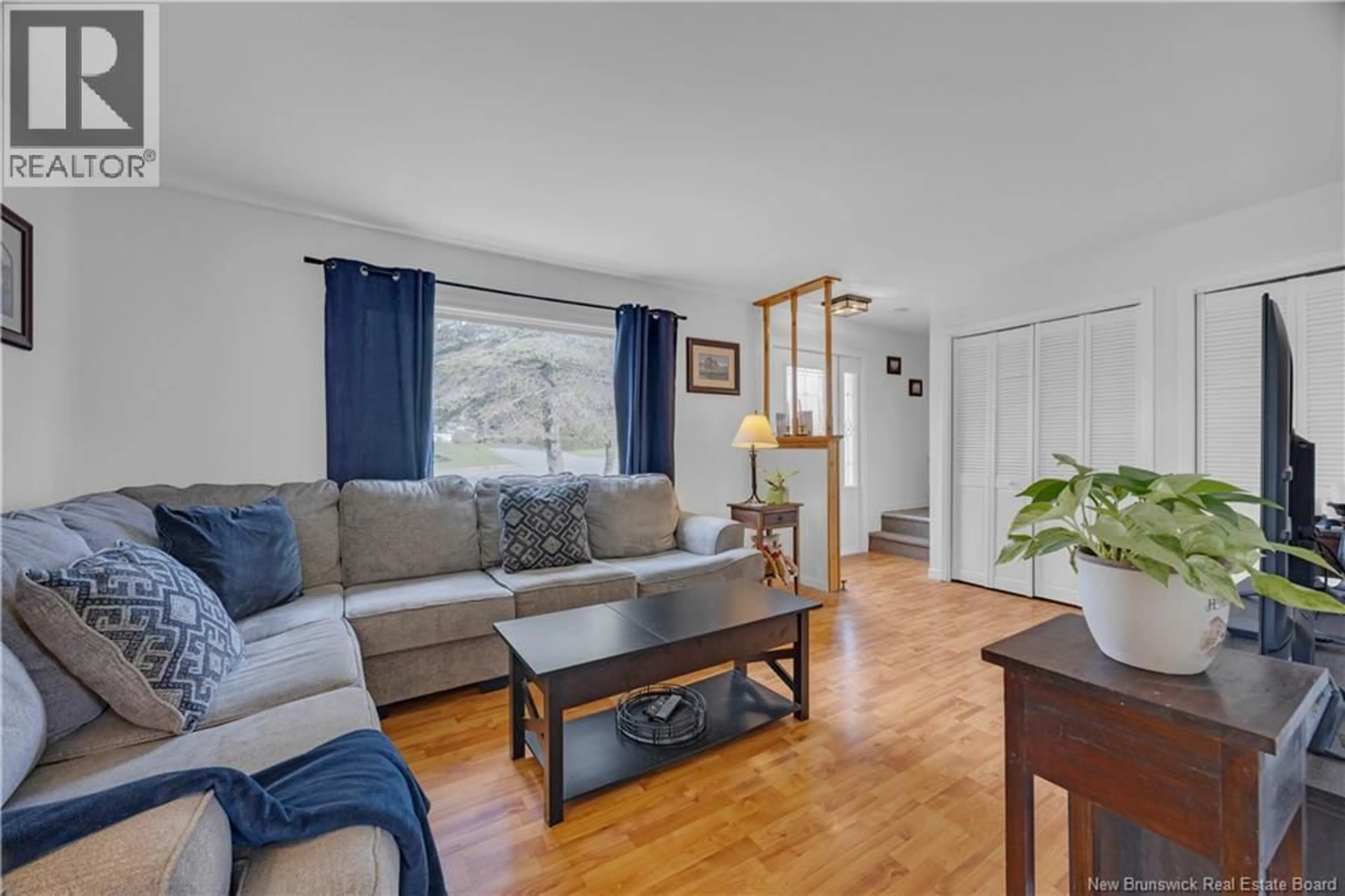 Living room with furniture, wood/laminate floor for 150 RIVER HILL DRIVE, Saint John New Brunswick E2M4T7