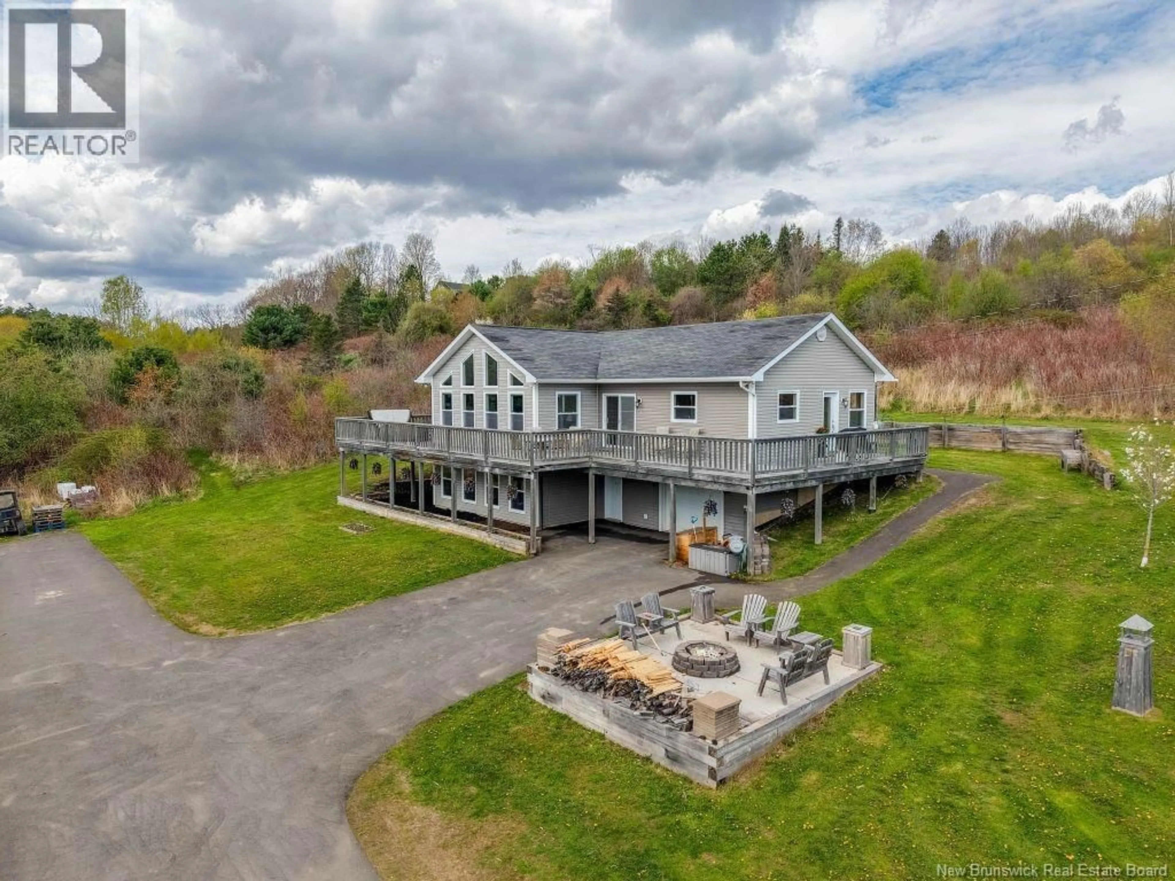 A pic from outside/outdoor area/front of a property/back of a property/a pic from drone, unknown for 11 GRAMPS LANE, Douglas New Brunswick E3G7J5