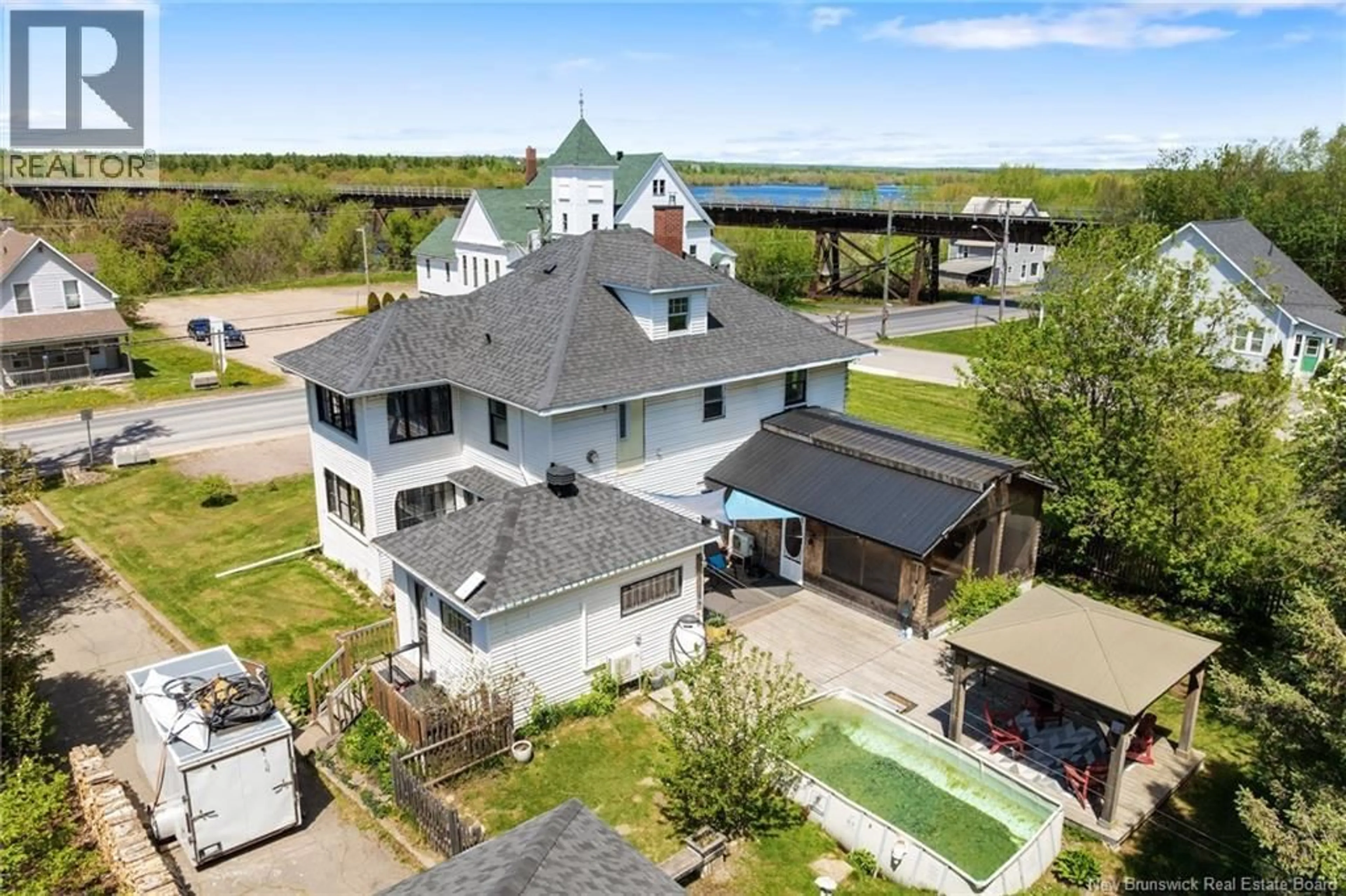 A pic from outside/outdoor area/front of a property/back of a property/a pic from drone, water/lake/river/ocean view for 209 MAIN STREET, Chipman New Brunswick E4A1X3