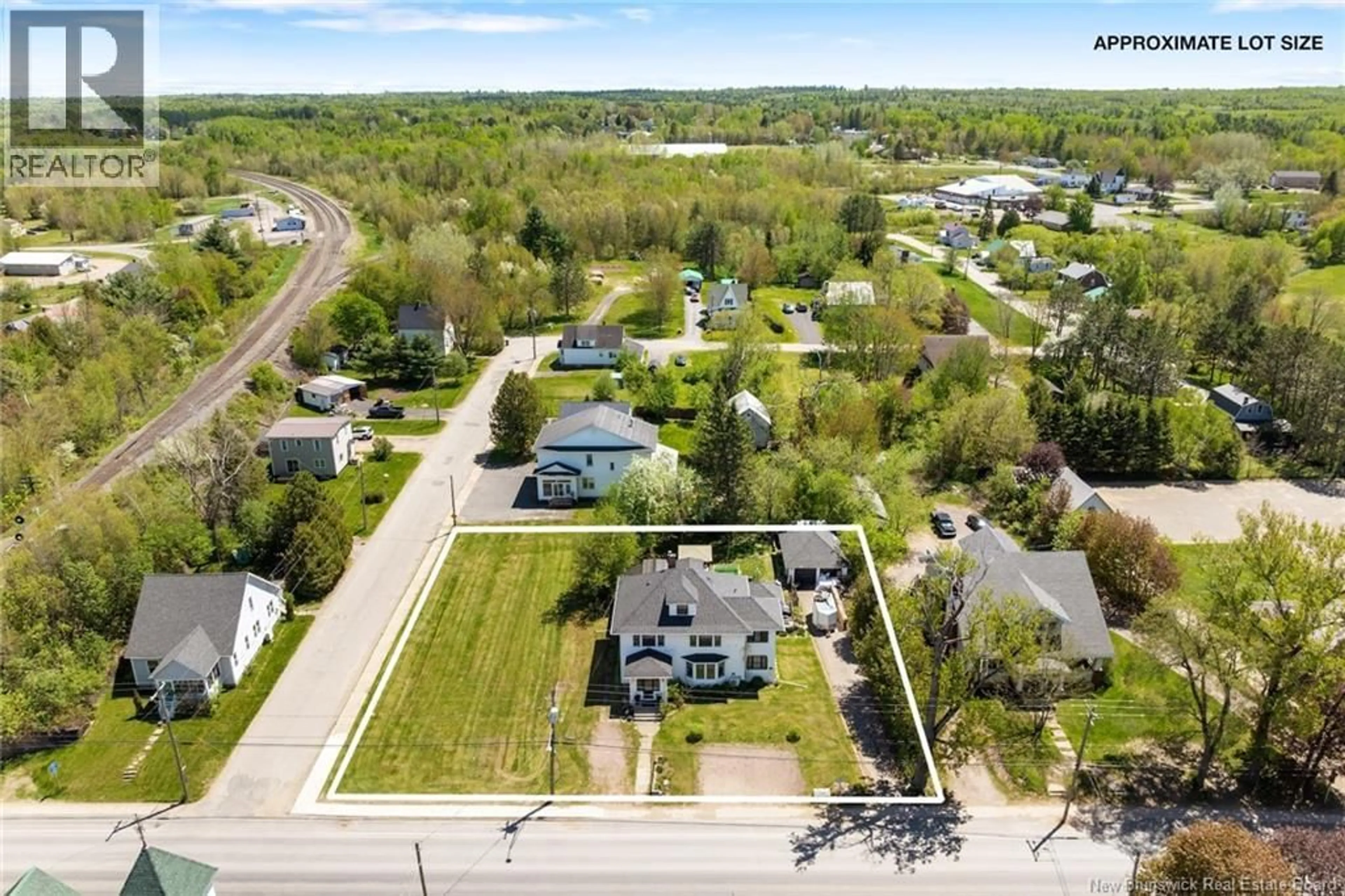 A pic from outside/outdoor area/front of a property/back of a property/a pic from drone, street for 209 MAIN STREET, Chipman New Brunswick E4A1X3