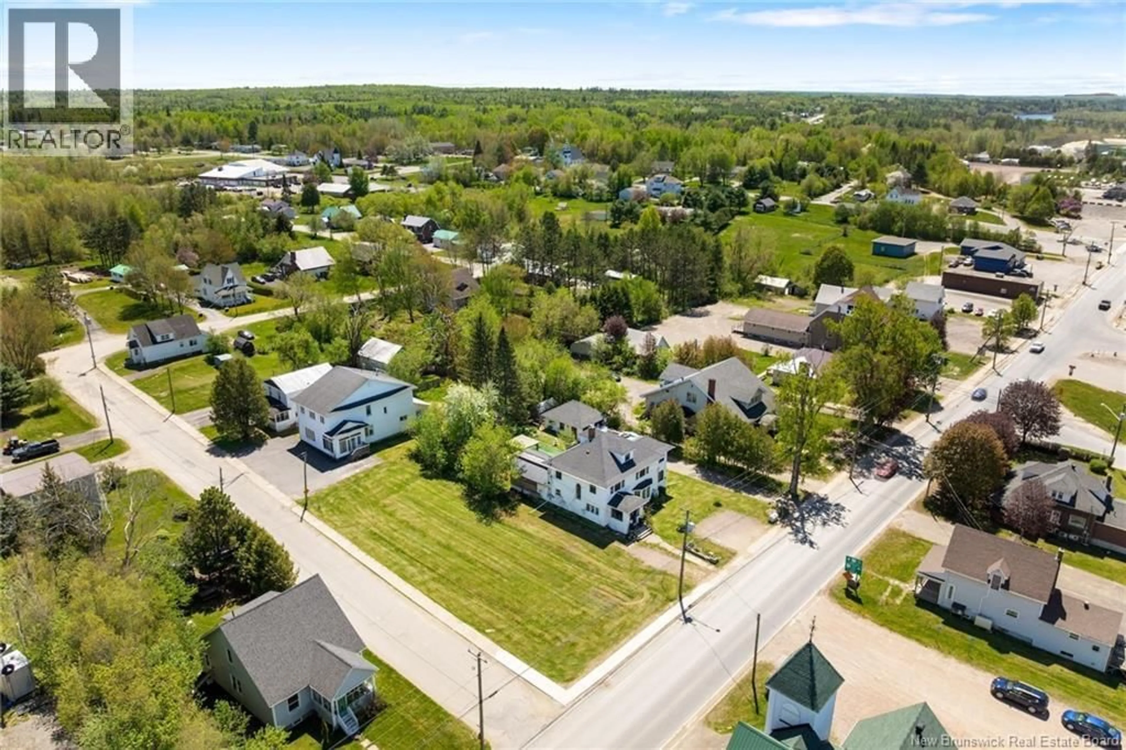 A pic from outside/outdoor area/front of a property/back of a property/a pic from drone, street for 209 MAIN STREET, Chipman New Brunswick E4A1X3