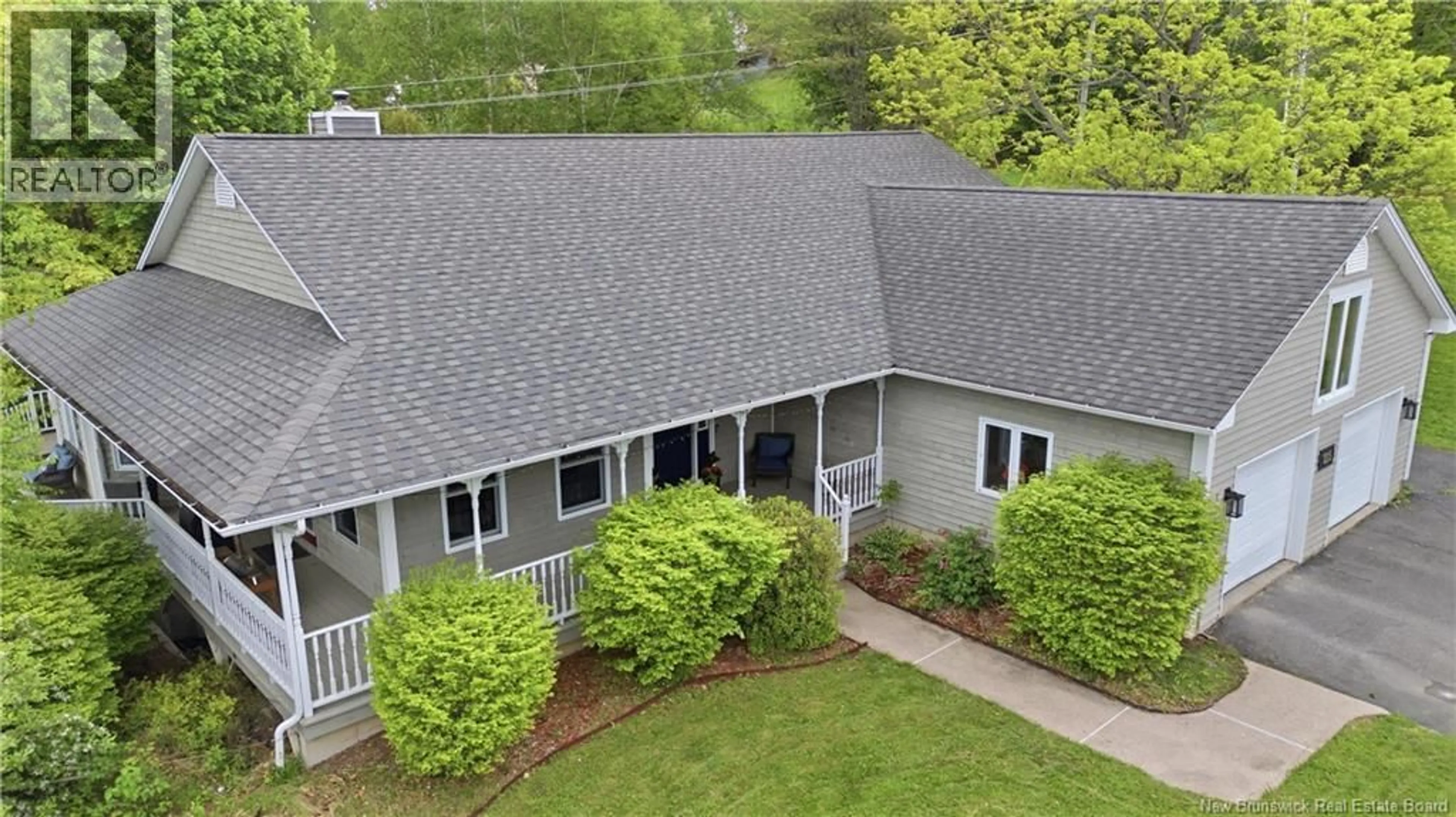 A pic from outside/outdoor area/front of a property/back of a property/a pic from drone, unknown for 215 COBURN COURT, Fredericton New Brunswick E3B7A6