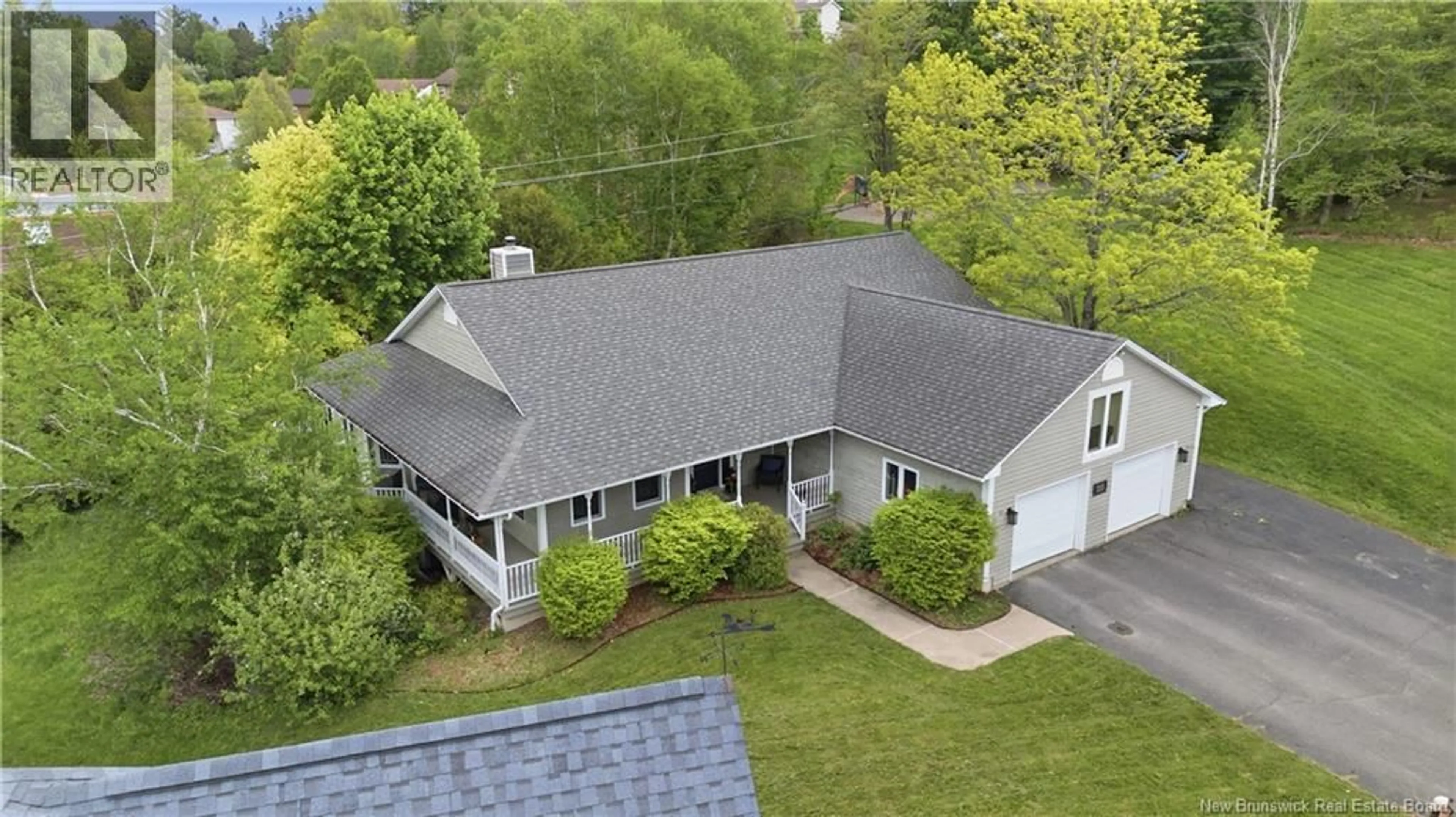 A pic from outside/outdoor area/front of a property/back of a property/a pic from drone, street for 215 COBURN COURT, Fredericton New Brunswick E3B7A6