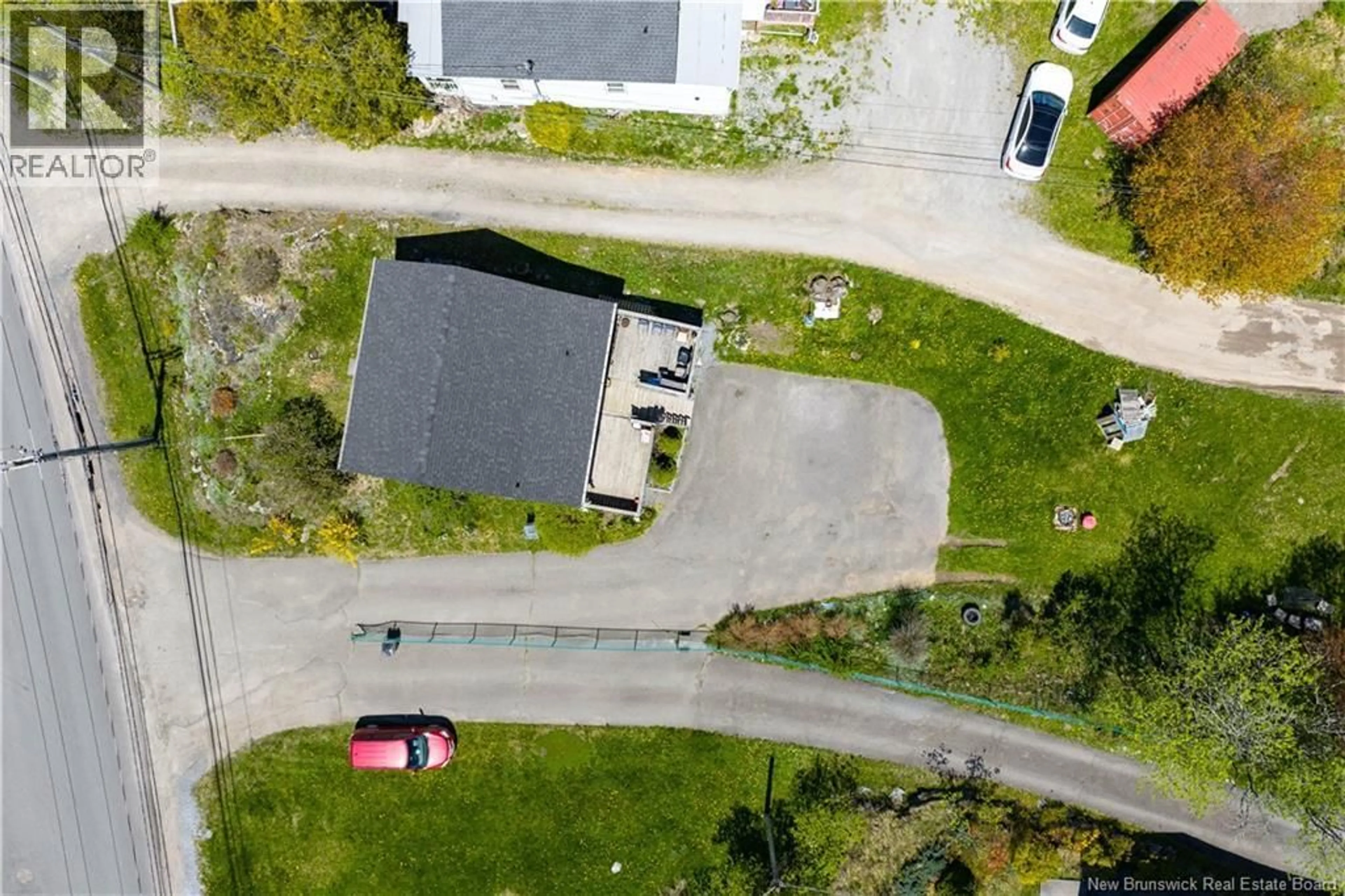 A pic from outside/outdoor area/front of a property/back of a property/a pic from drone, street for 171 SANDY POINT ROAD, Saint John New Brunswick E2K3R6