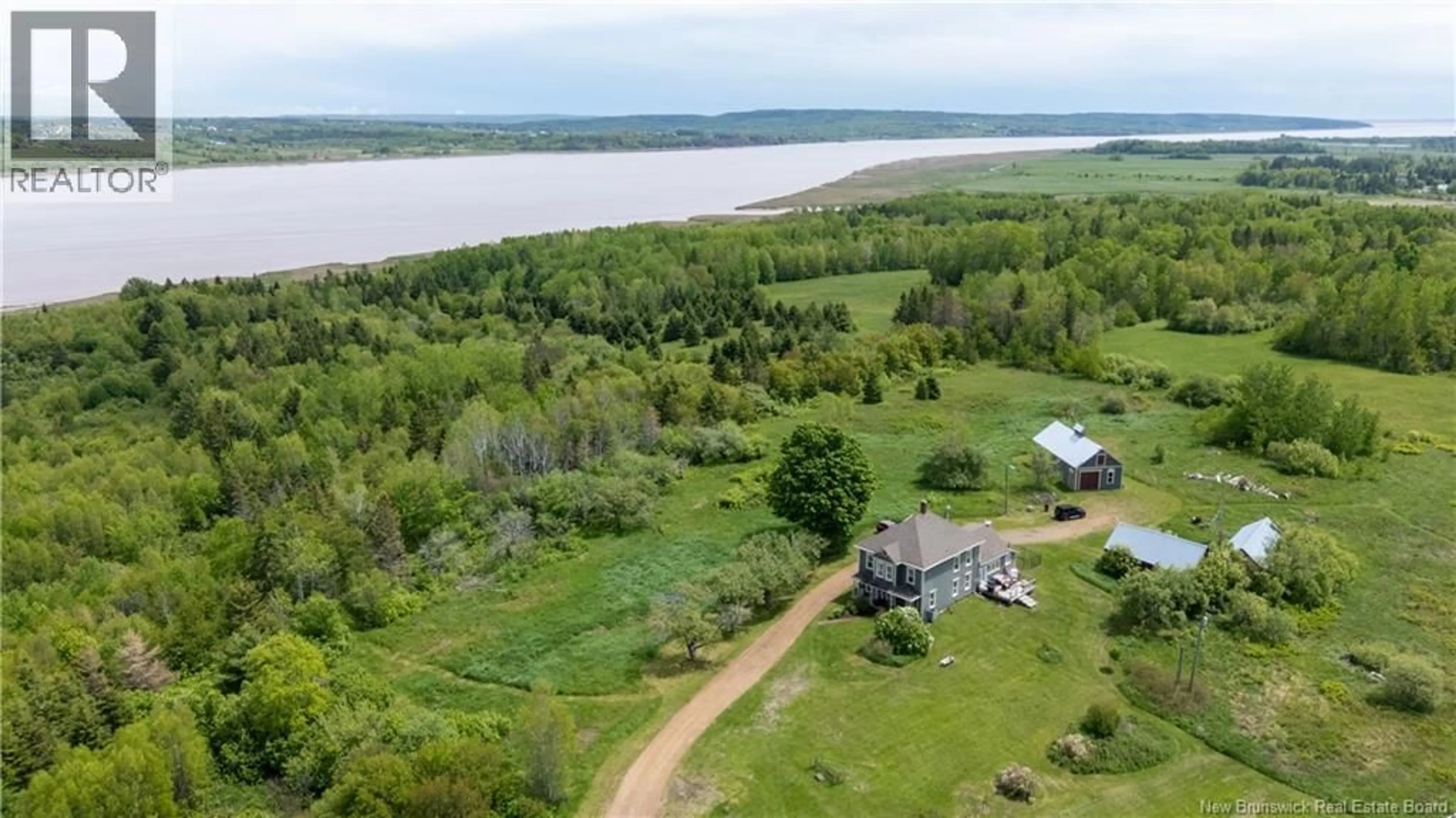 A pic from outside/outdoor area/front of a property/back of a property/a pic from drone, water/lake/river/ocean view for 32 WILLOW GROVE LANE, Weldon New Brunswick E4H4P6