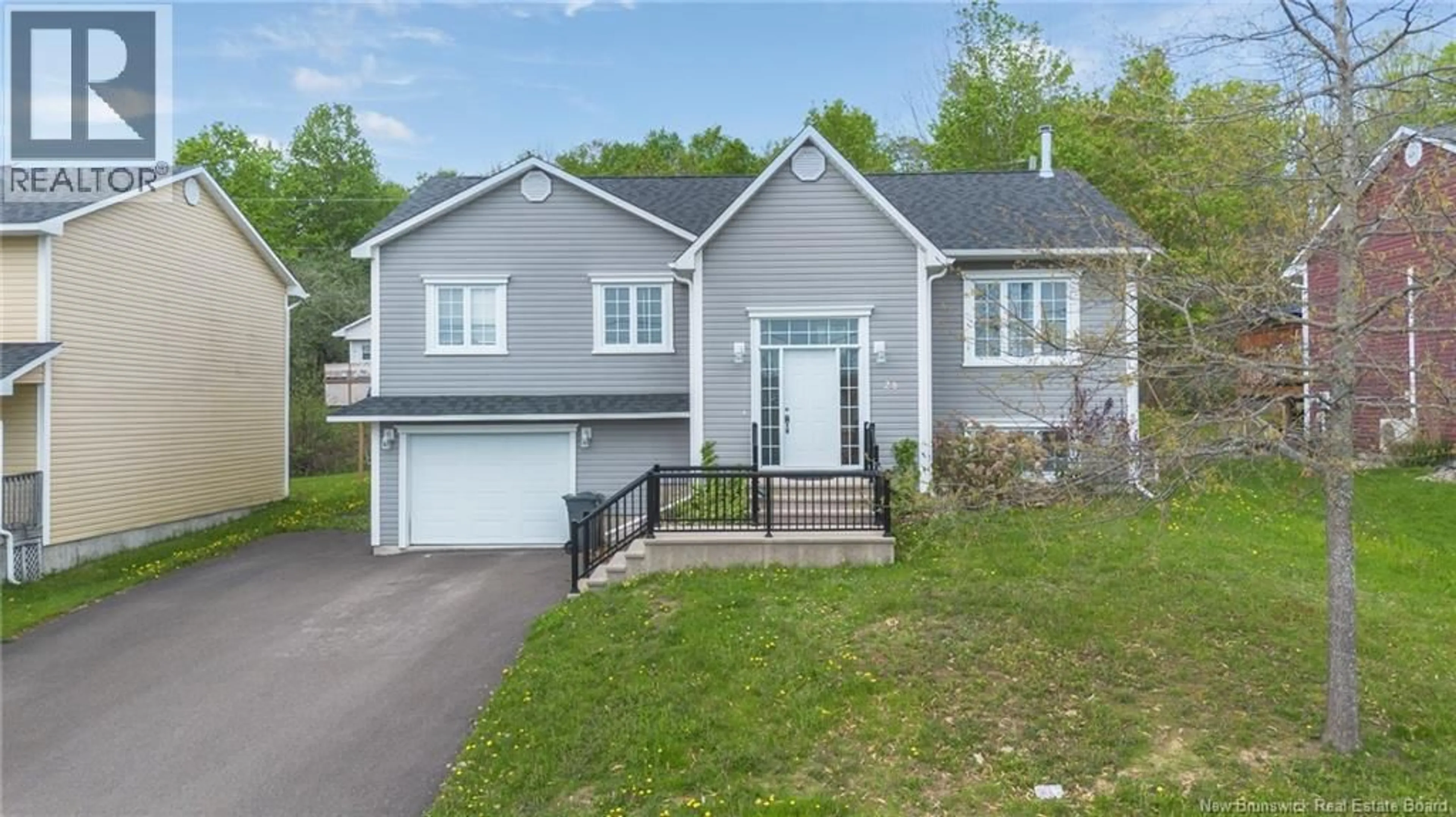 Home with vinyl exterior material, street for 28 BRANDON COURT, Fredericton New Brunswick E3G0X5