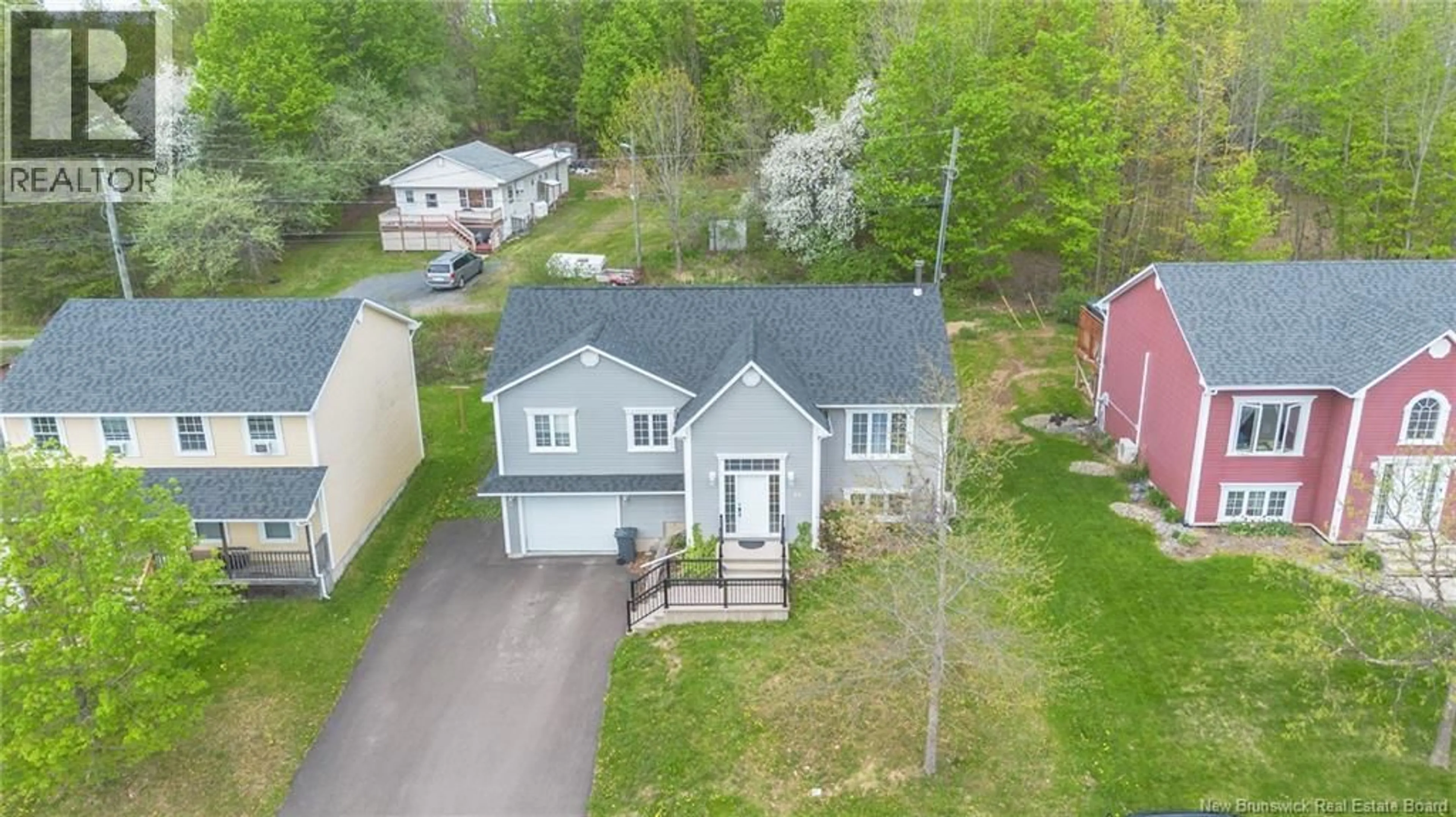 A pic from outside/outdoor area/front of a property/back of a property/a pic from drone, street for 28 BRANDON COURT, Fredericton New Brunswick E3G0X5