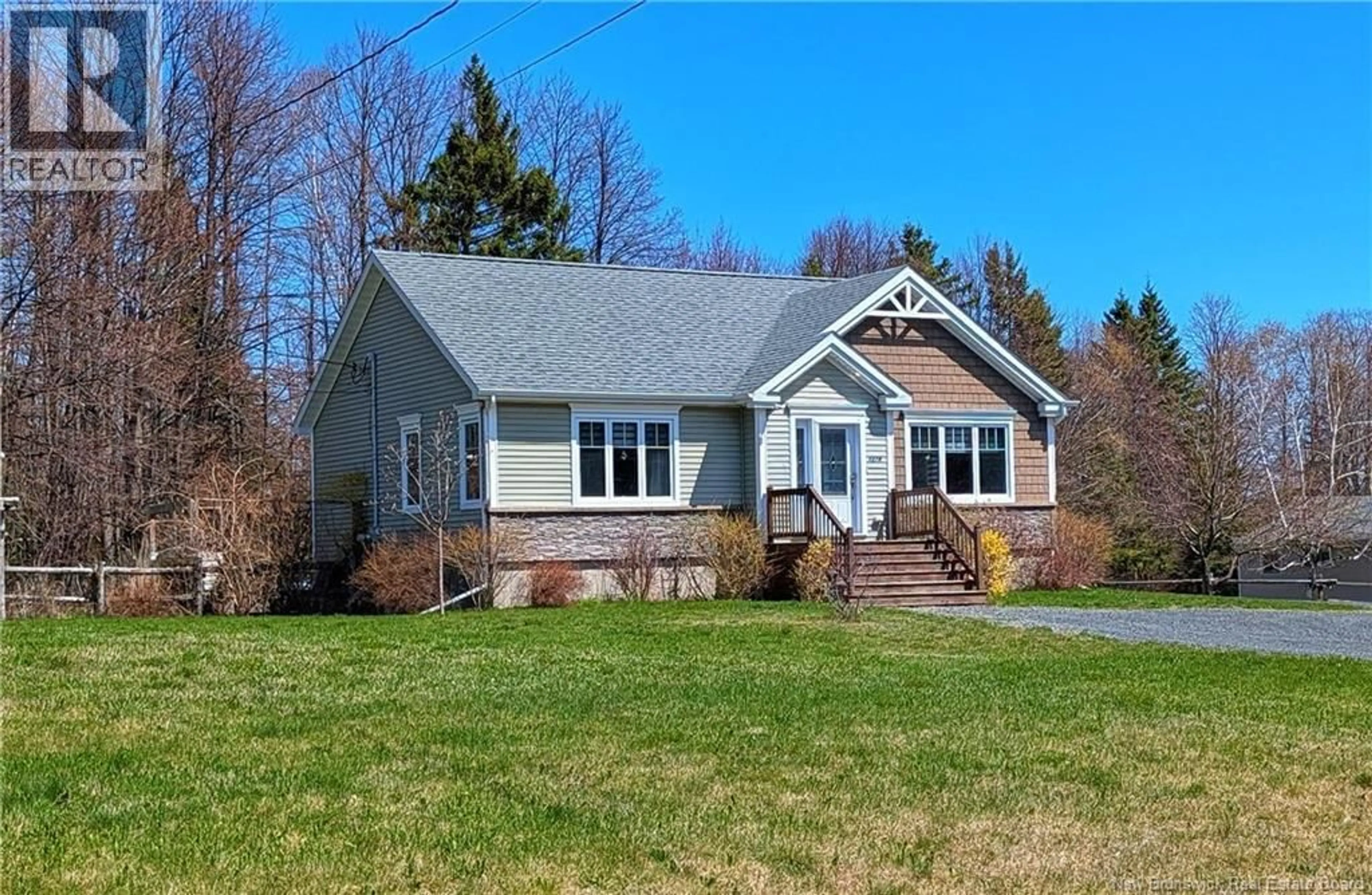 Home with vinyl exterior material, street for 1274 YOUGHALL DRIVE, Bathurst New Brunswick E2A4Y3