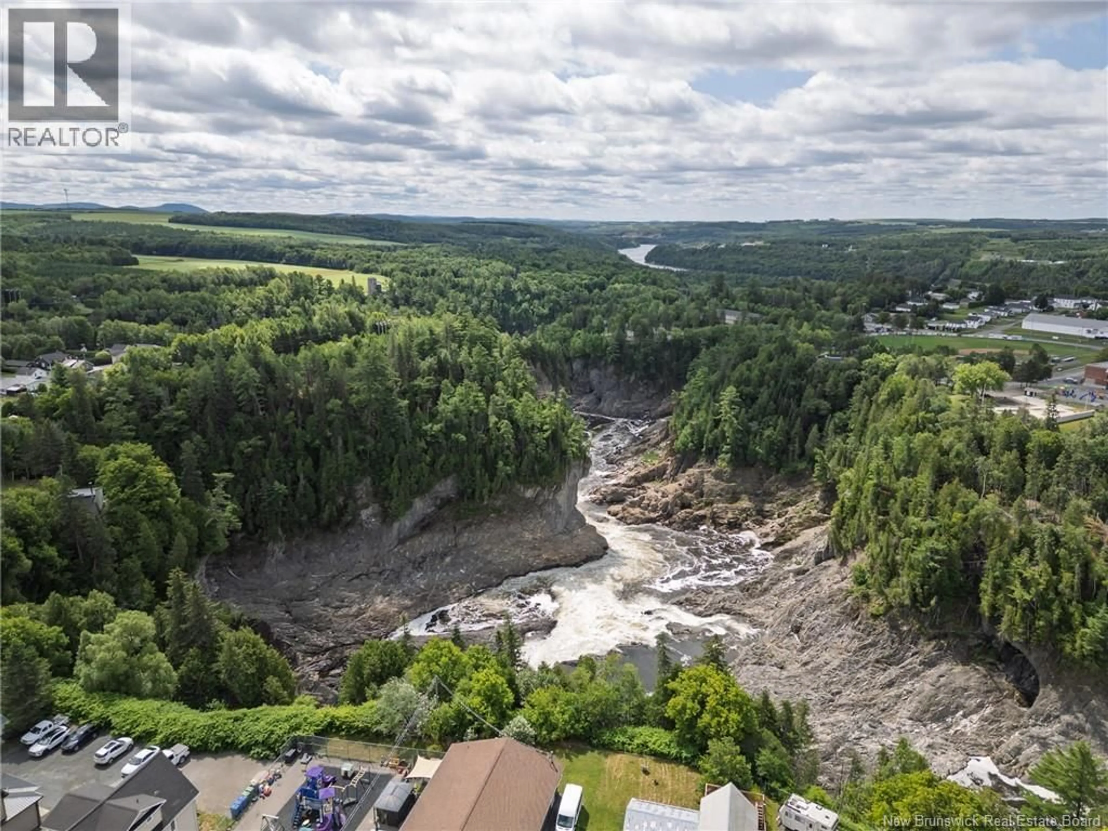 A pic from outside/outdoor area/front of a property/back of a property/a pic from drone, water/lake/river/ocean view for 90 TOBIQUE ROAD, Grand-Sault/Grand Falls New Brunswick E3Y3S8