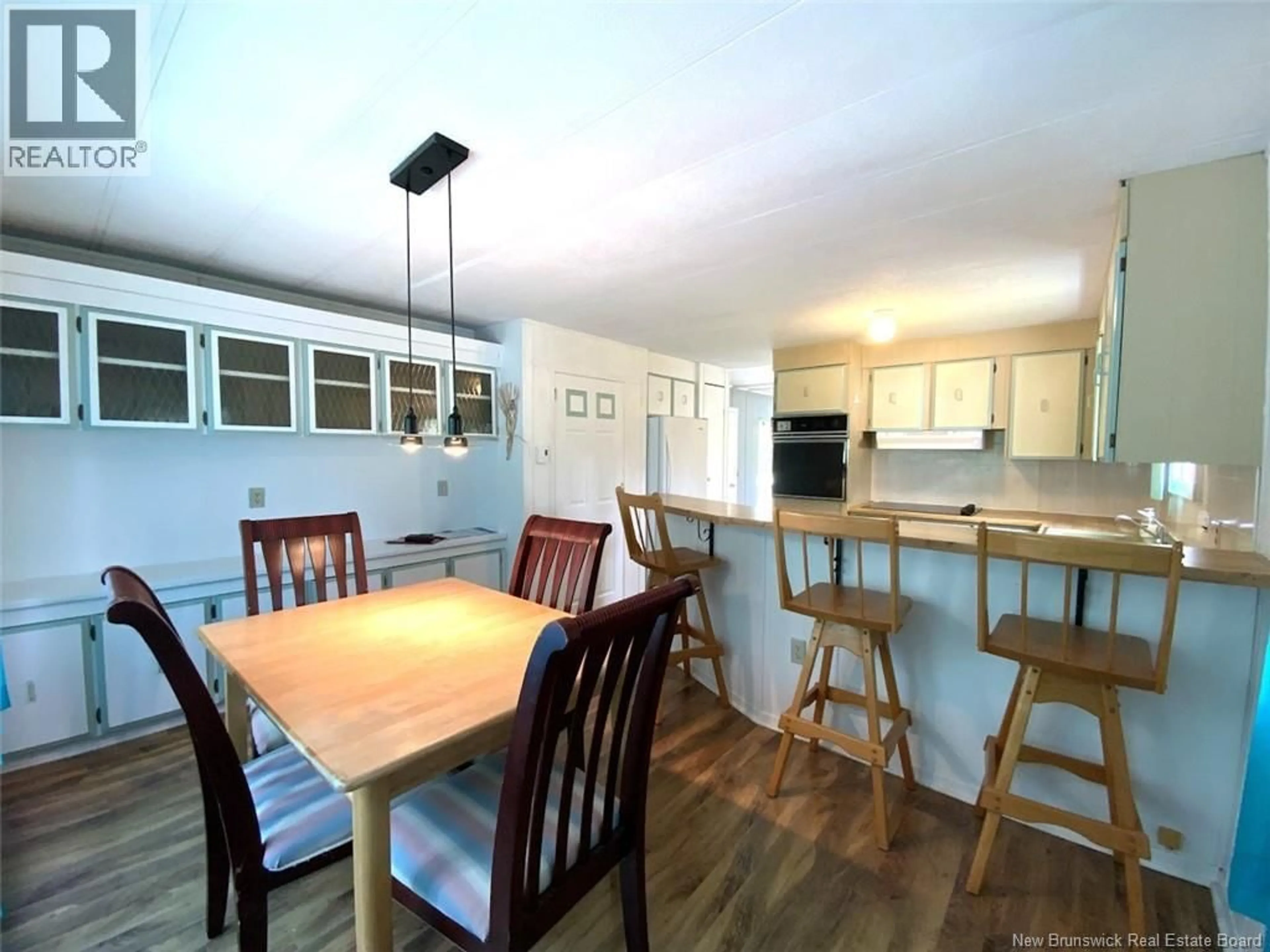 Open concept kitchen, wood/laminate floor for 98 DES ÉRABLES AVENUE, Clair New Brunswick E7A2C1