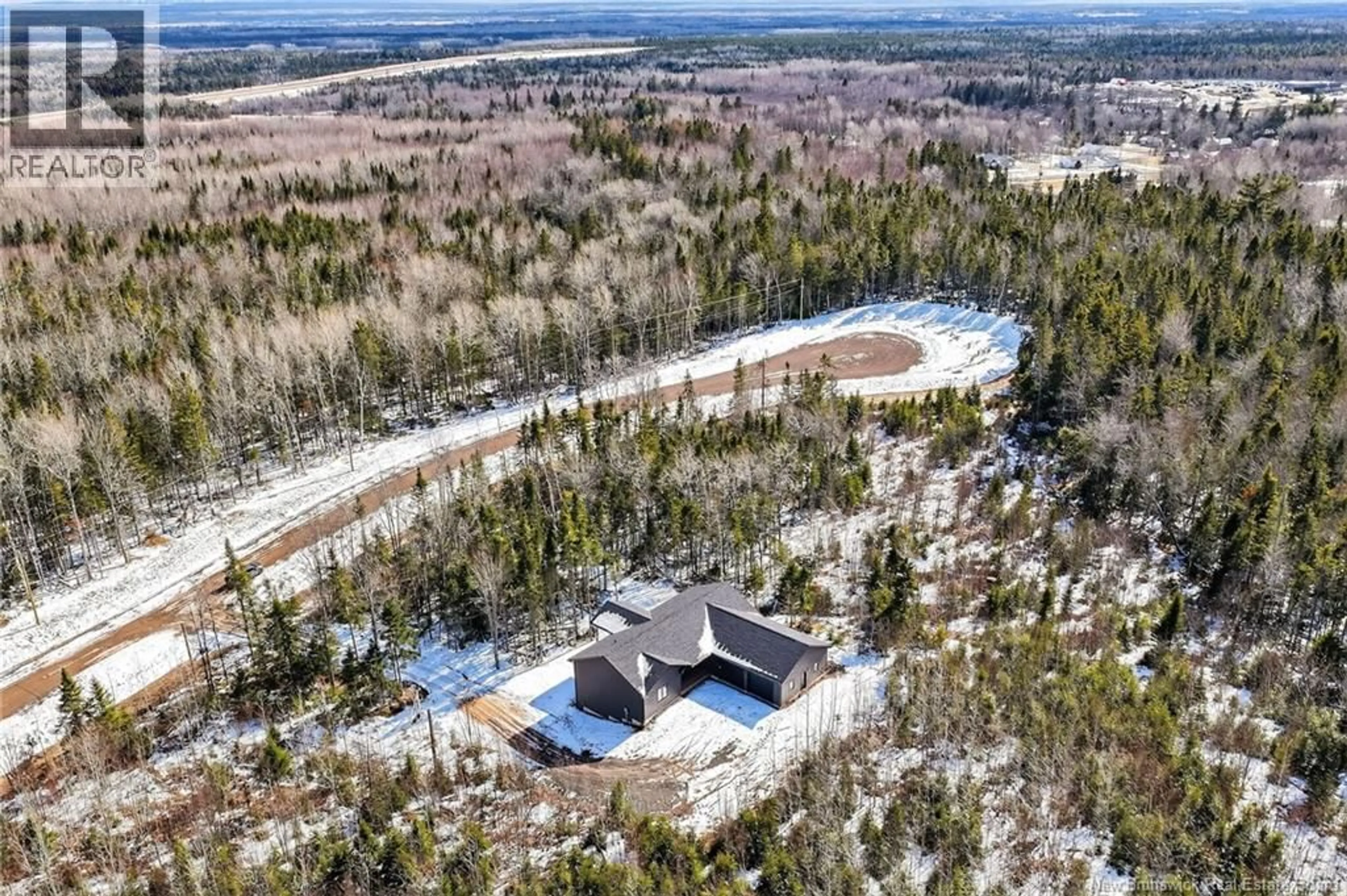 A pic from outside/outdoor area/front of a property/back of a property/a pic from drone, forest/trees view for 10 BRECKENRIDGE COURT, Lutes Mountain New Brunswick E1G5W8
