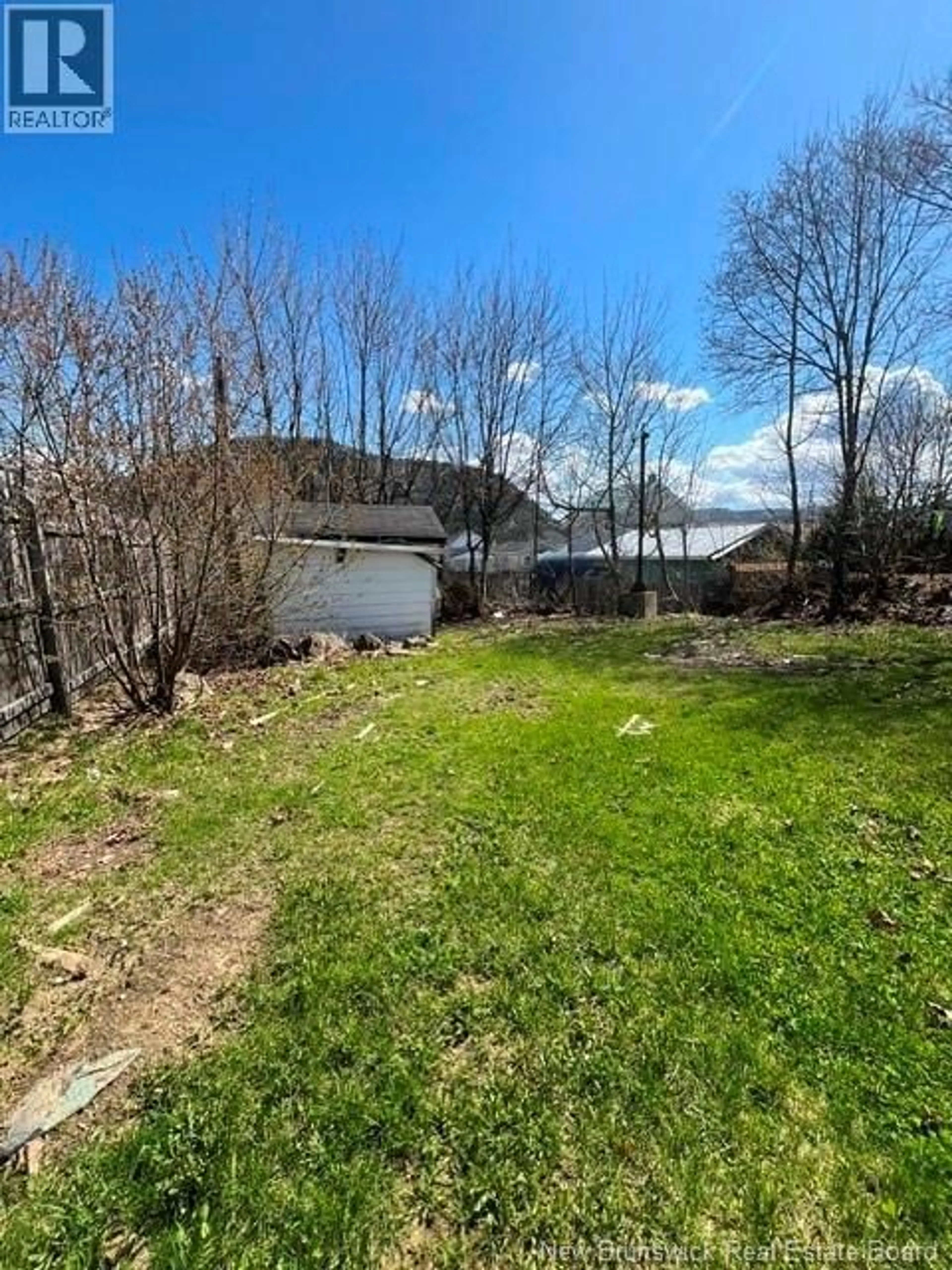 A pic from outside/outdoor area/front of a property/back of a property/a pic from drone, unknown for 62 DUNCAN STREET, Campbellton New Brunswick E3N2K9