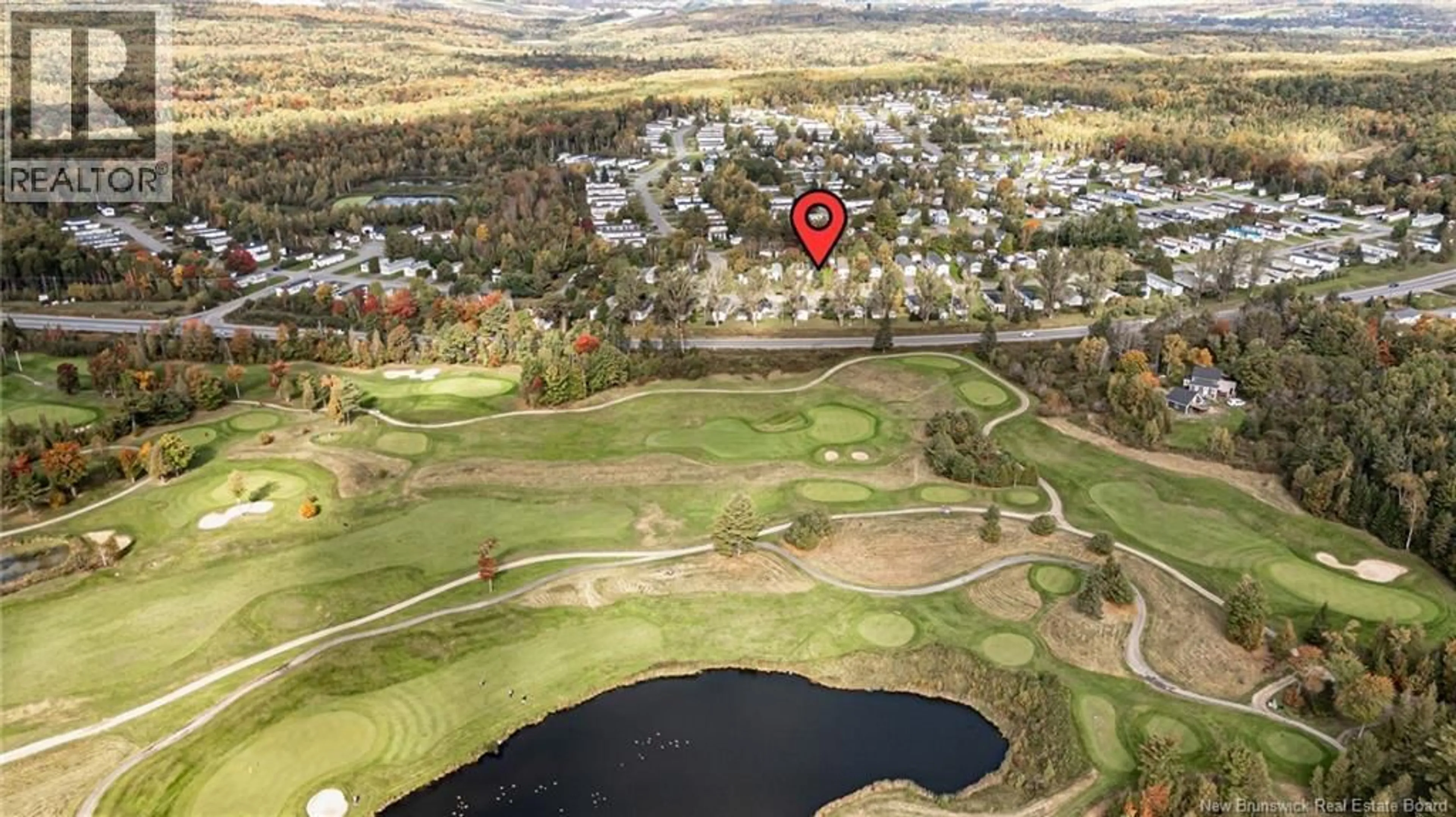 A pic from outside/outdoor area/front of a property/back of a property/a pic from drone, water/lake/river/ocean view for 86 HEDGEVIEW DRIVE, Fredericton New Brunswick E3B6R7
