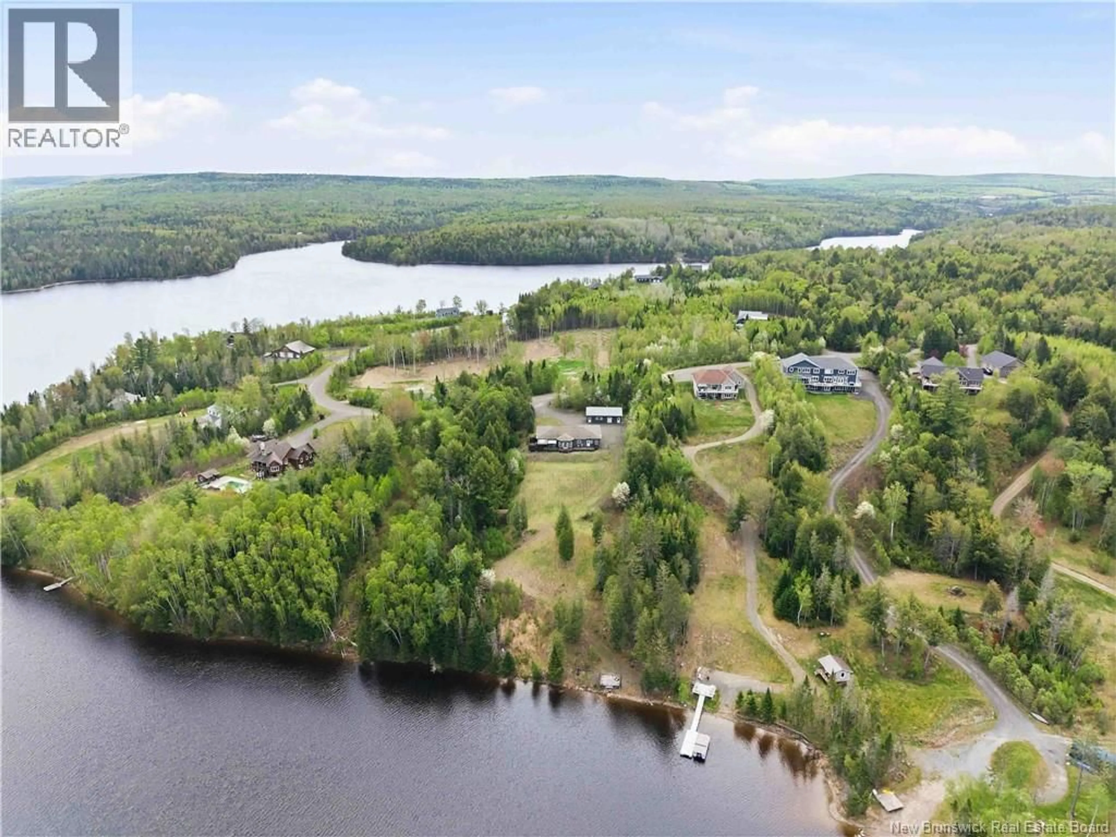 A pic from outside/outdoor area/front of a property/back of a property/a pic from drone, water/lake/river/ocean view for 75 LYNDSAY LANE, New Market New Brunswick E6K0A7
