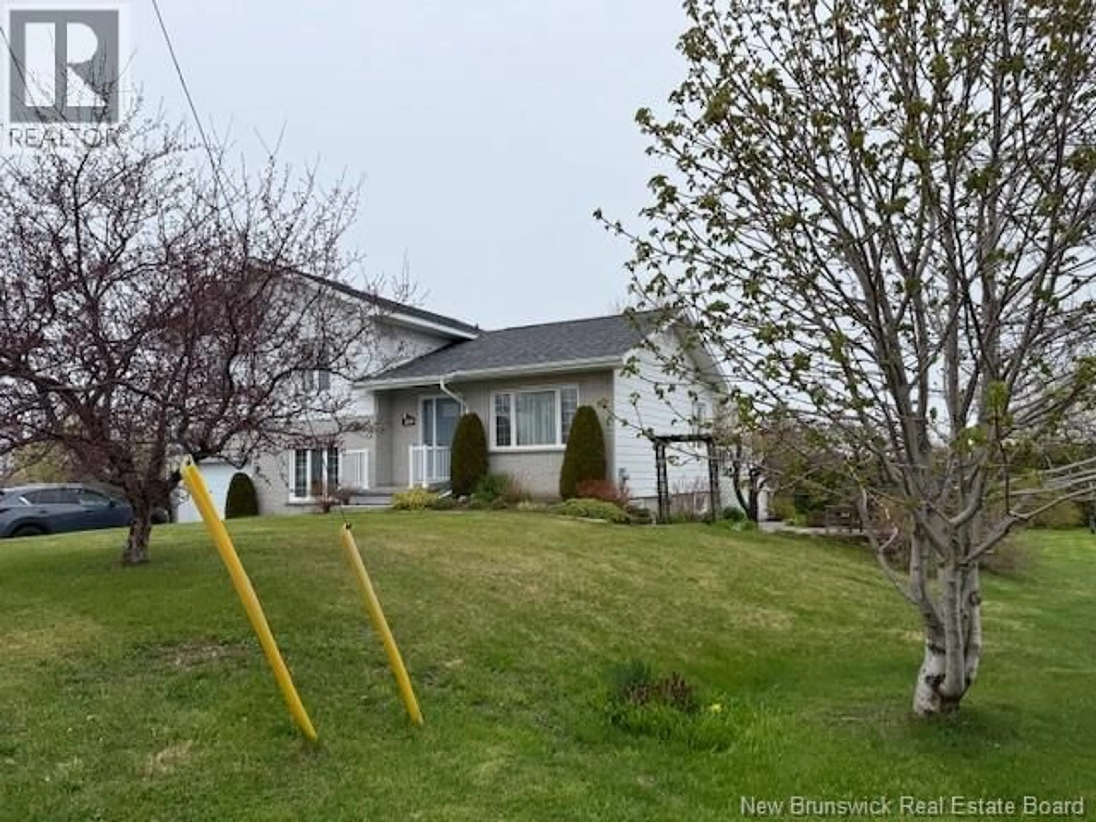 A pic from outside/outdoor area/front of a property/back of a property/a pic from drone, street for 469 CHALEUR STREET, Charlo New Brunswick E8E2C1