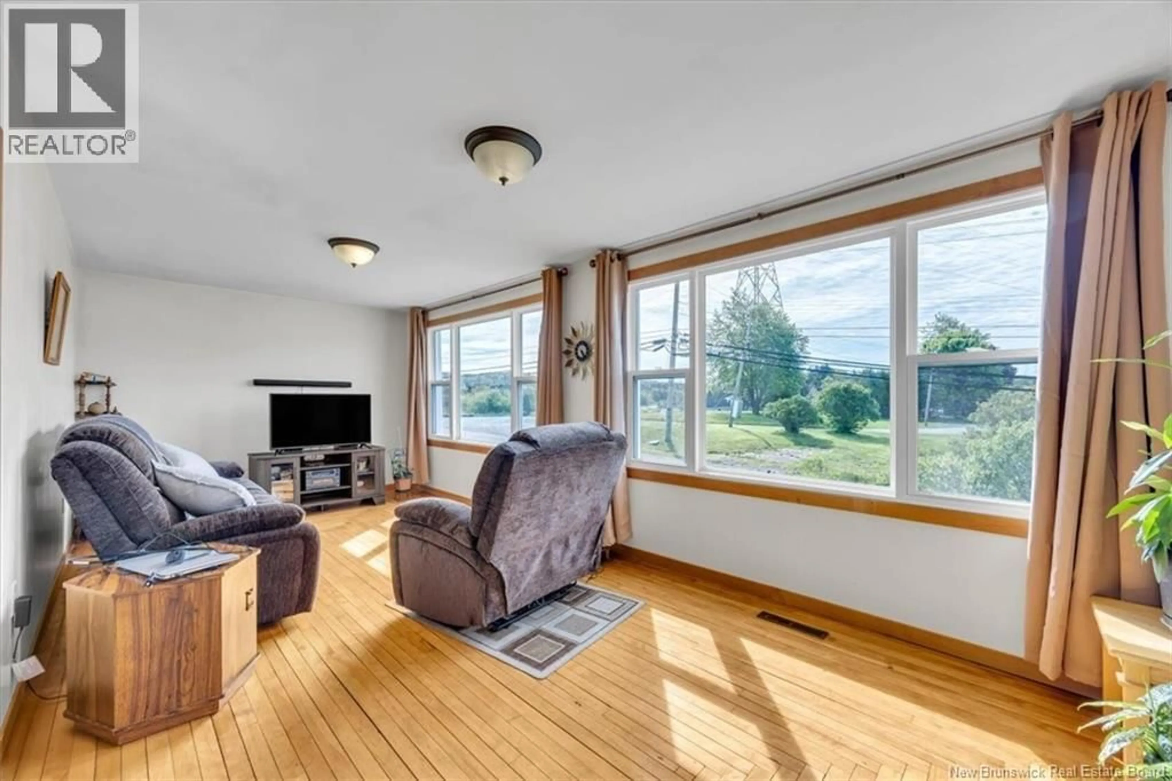 Living room with furniture, wood/laminate floor for 263 GOLDEN GROVE ROAD, Saint John New Brunswick E2H1X3