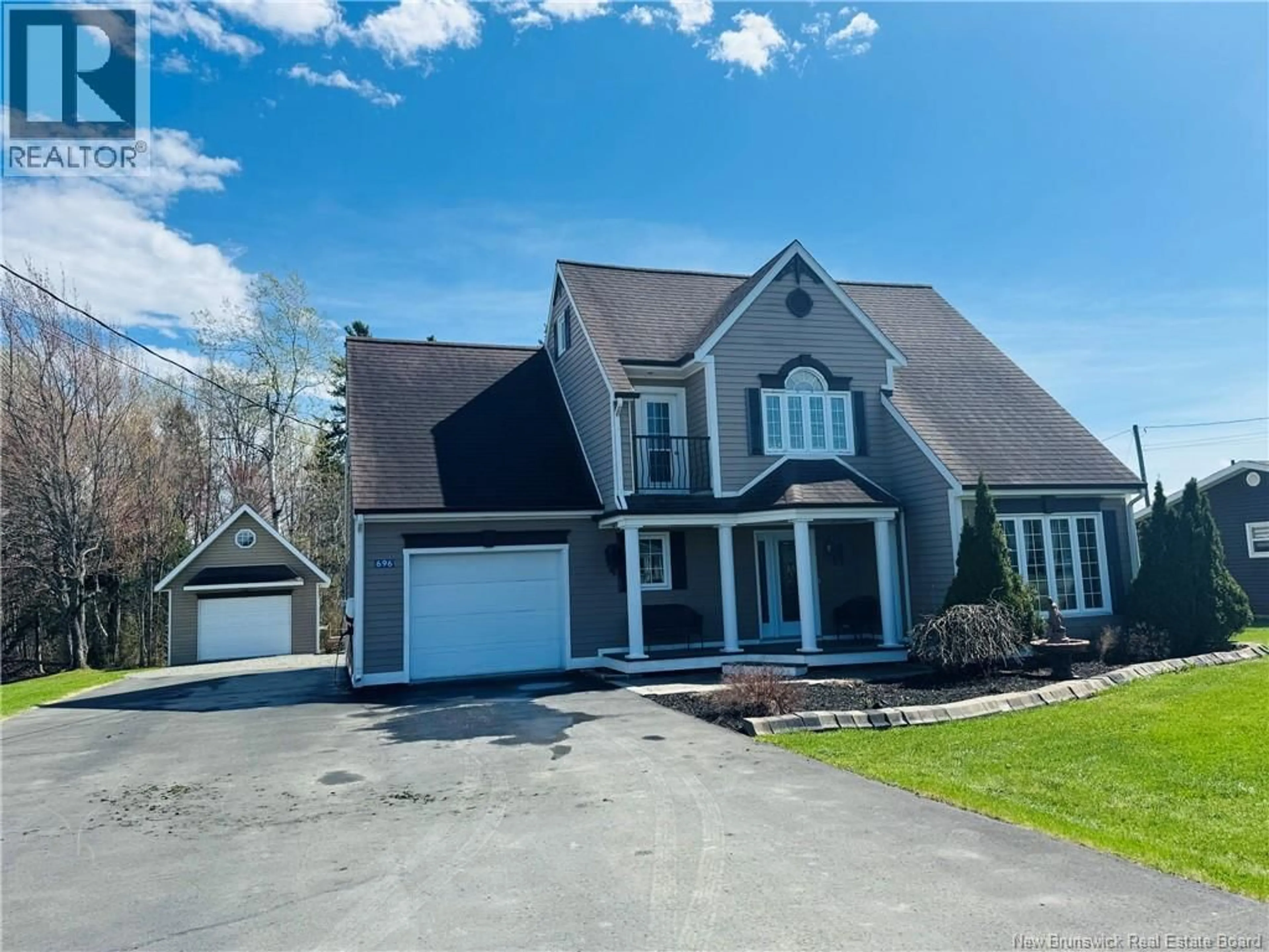 Home with vinyl exterior material, street for 696 DES PIONNIERS AVENUE, Balmoral New Brunswick E8E1E3