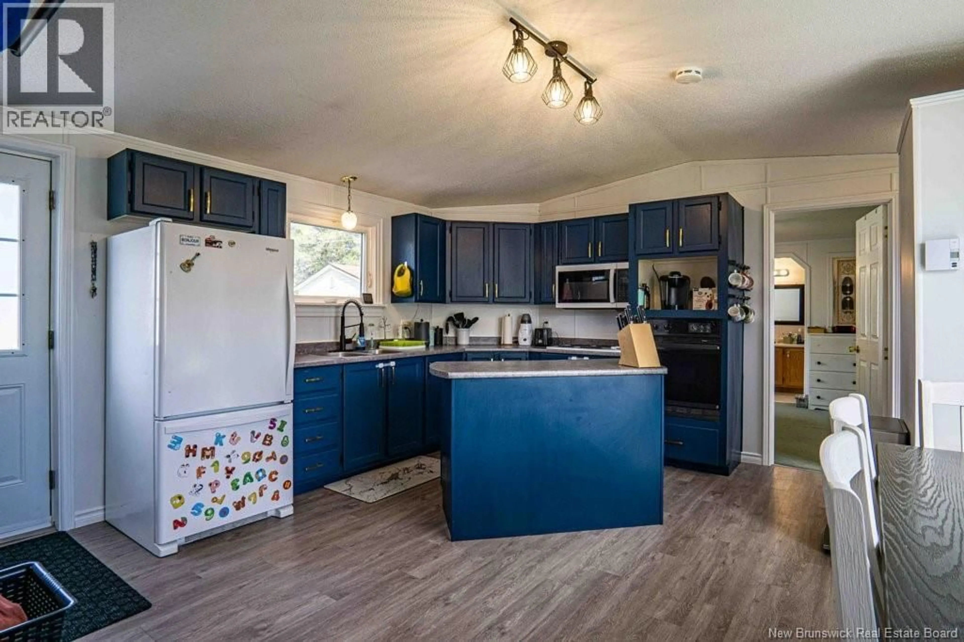 Open concept kitchen, wood/laminate floor for 95 CURRIE CRESCENT, Waasis New Brunswick E3B7H3