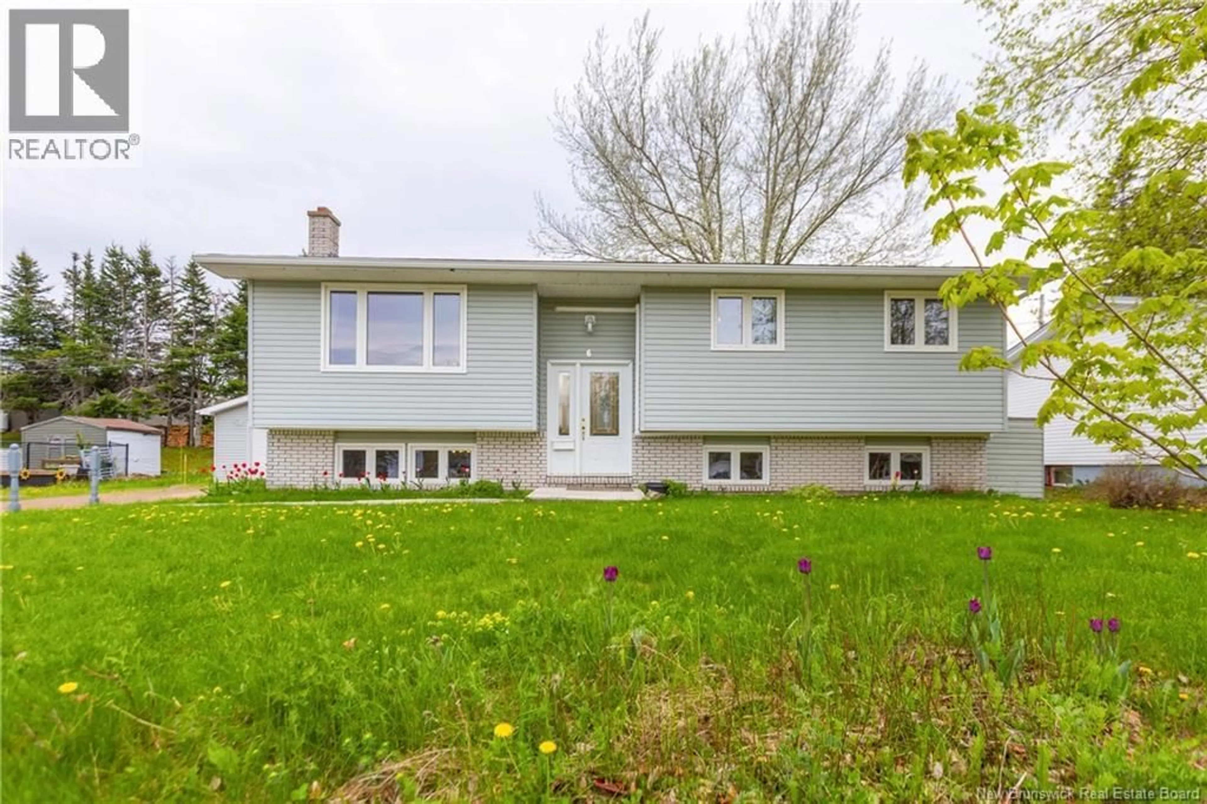 Home with vinyl exterior material, street for 6 AIRVIEW, Dieppe New Brunswick E1A4Z9