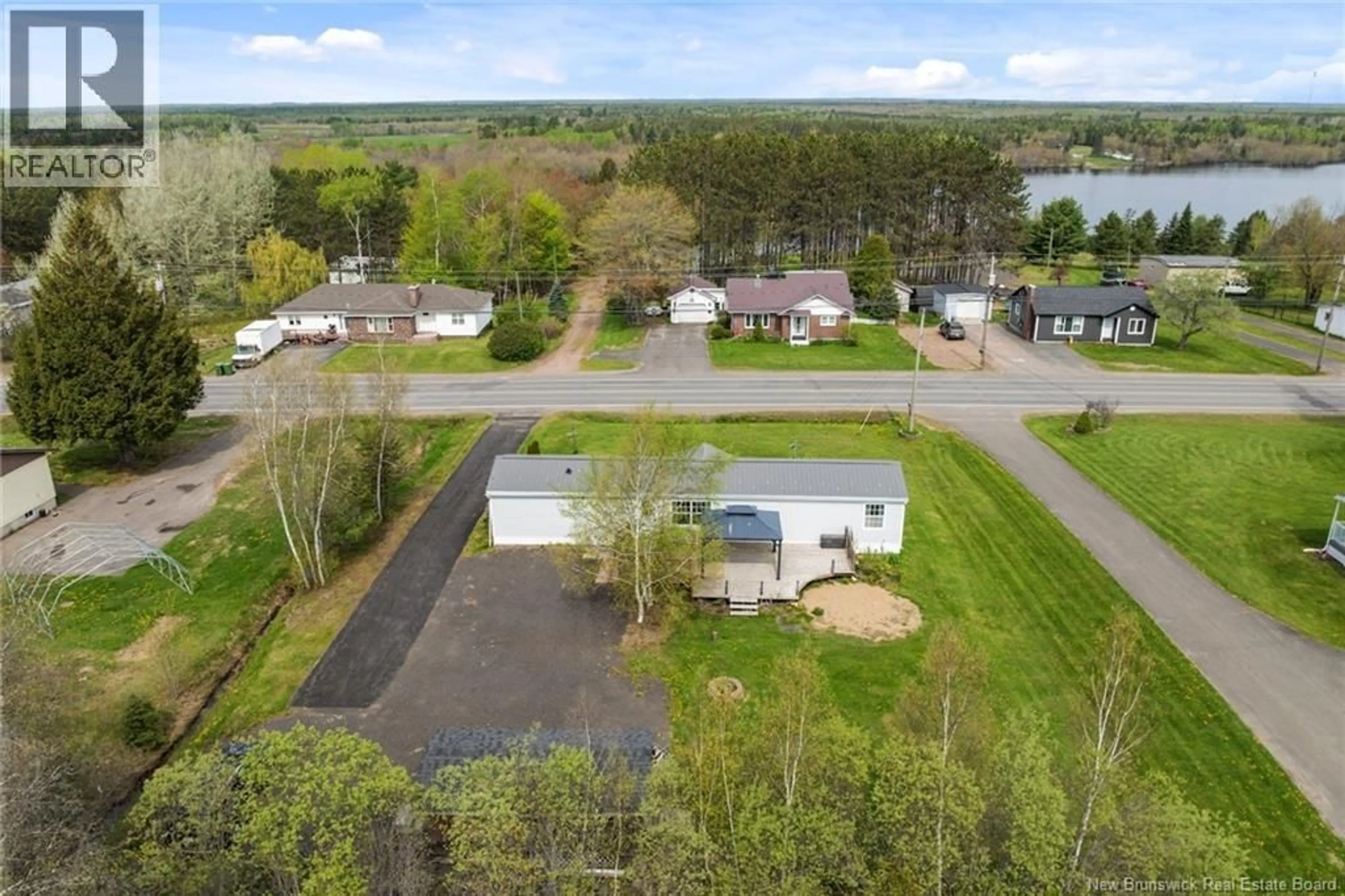 A pic from outside/outdoor area/front of a property/back of a property/a pic from drone, water/lake/river/ocean view for 589 MAIN ST, Chipman New Brunswick E4A2J1