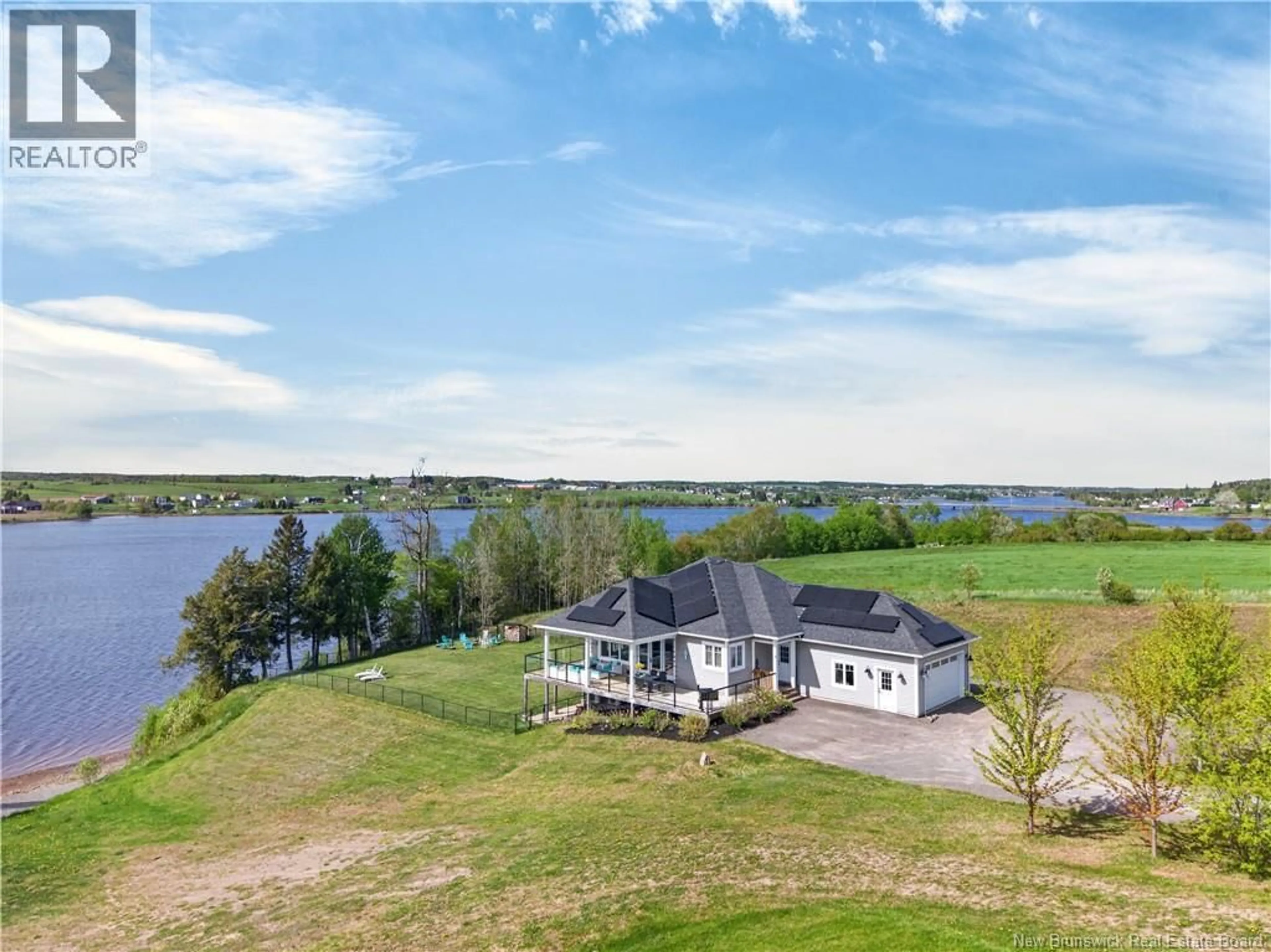 A pic from outside/outdoor area/front of a property/back of a property/a pic from drone, water/lake/river/ocean view for 16 CHARLES A LOUIS LANE, Sainte-Marie-De-Kent New Brunswick E4S0H2