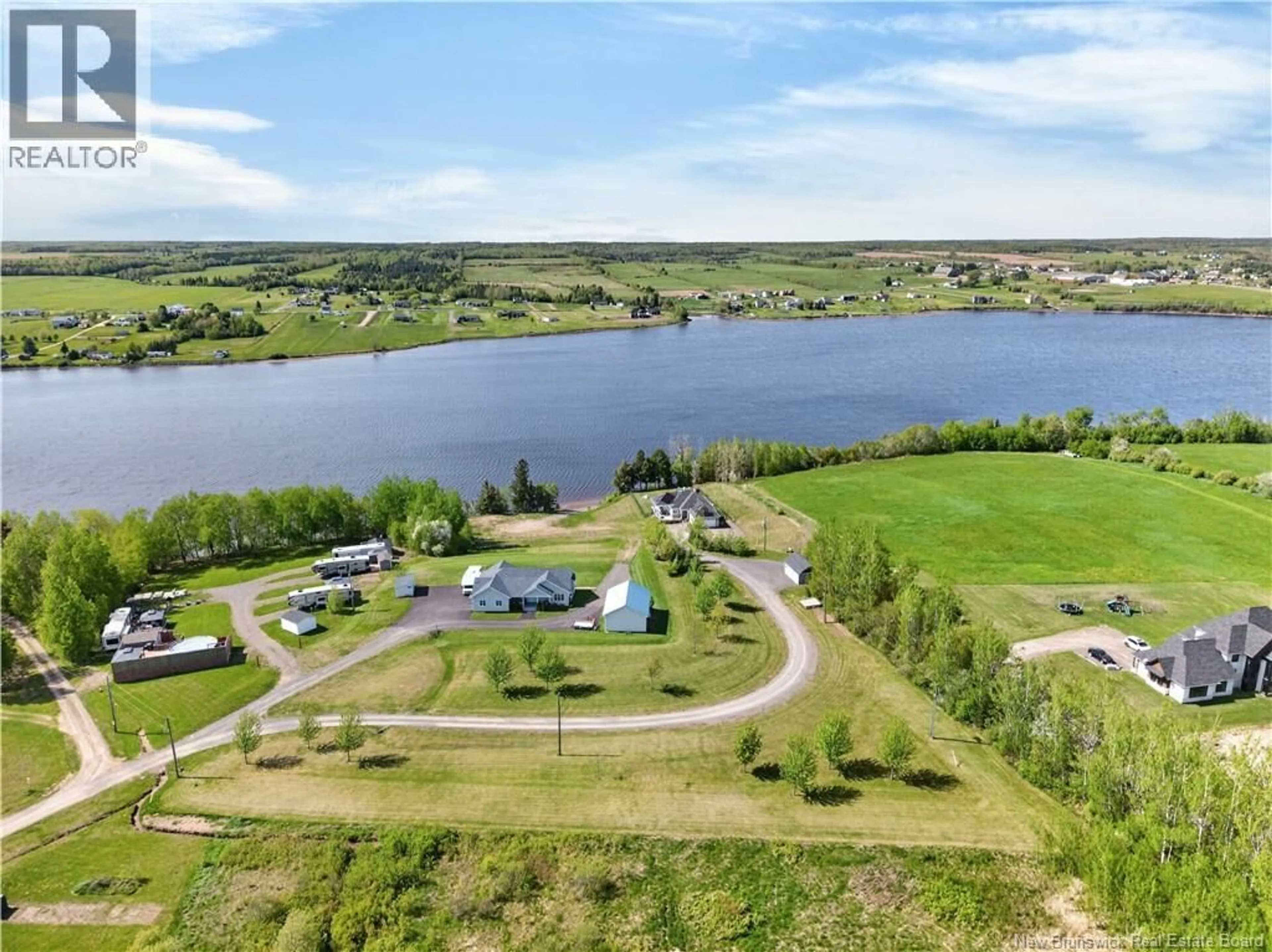 A pic from outside/outdoor area/front of a property/back of a property/a pic from drone, water/lake/river/ocean view for 16 CHARLES A LOUIS LANE, Sainte-Marie-De-Kent New Brunswick E4S0H2