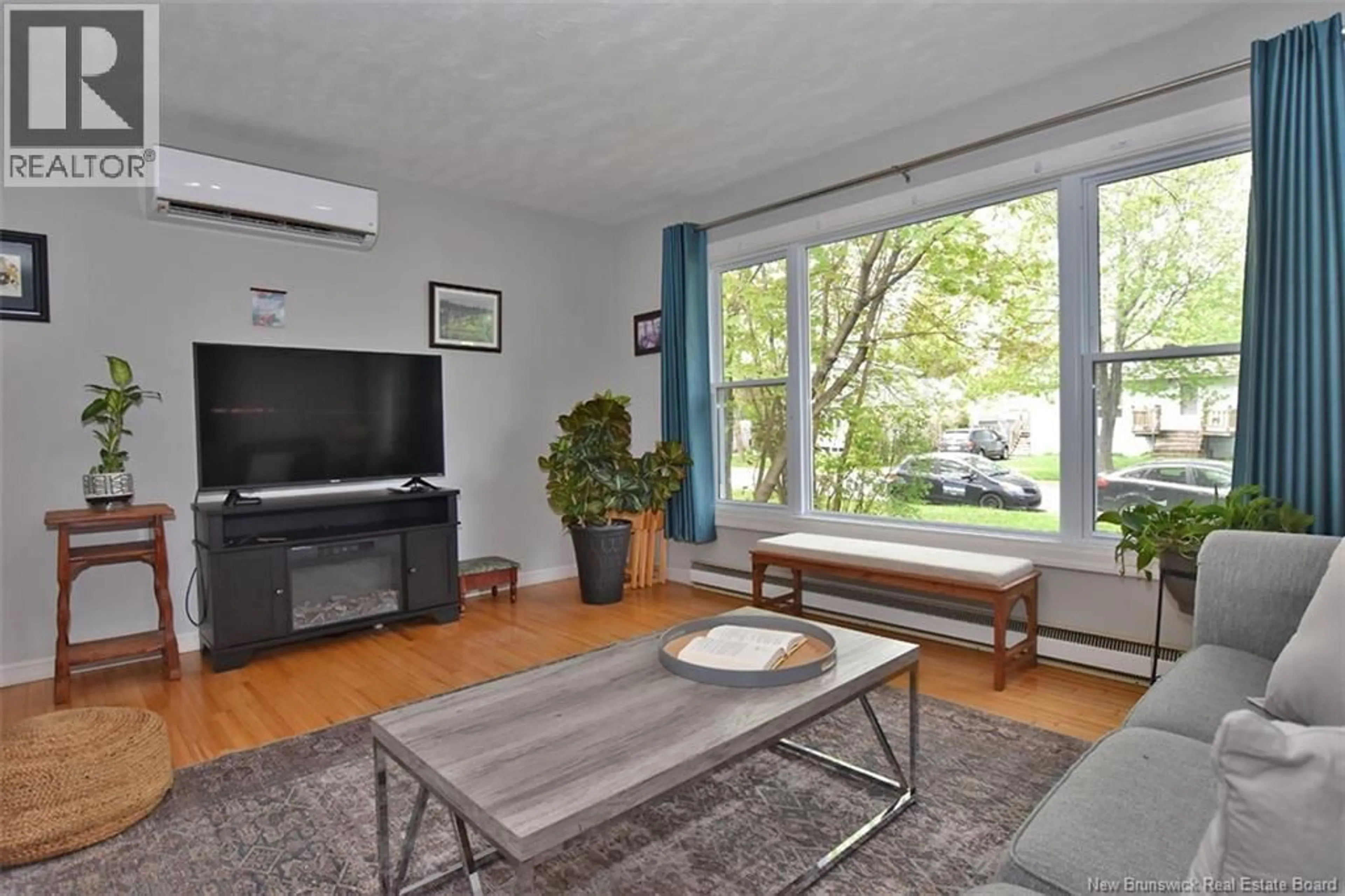 Living room with furniture, unknown for 101 MCGRAND COURT, Fredericton New Brunswick E3A1H7