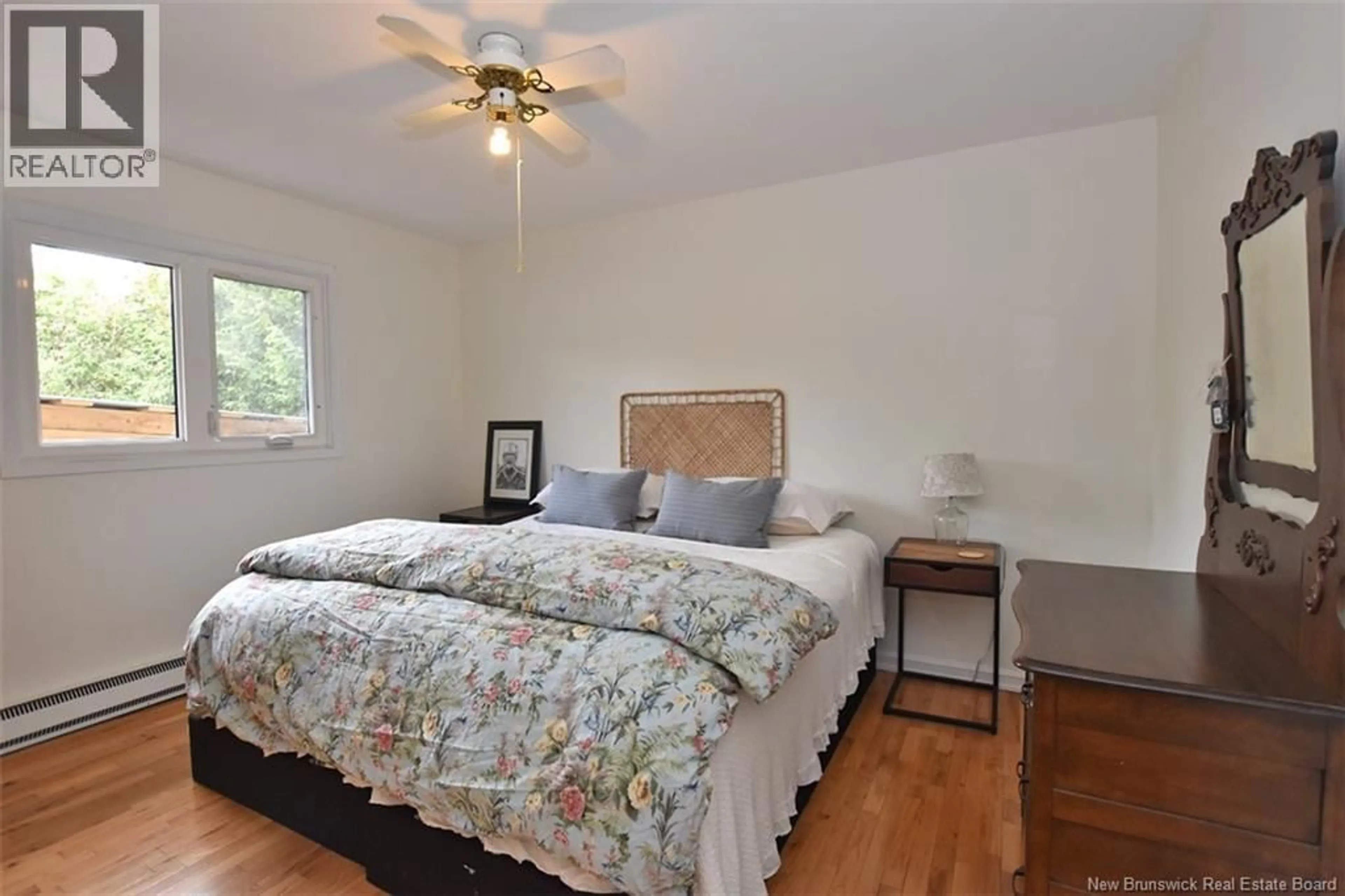 Bedroom with bed, wood/laminate floor for 101 MCGRAND COURT, Fredericton New Brunswick E3A1H7