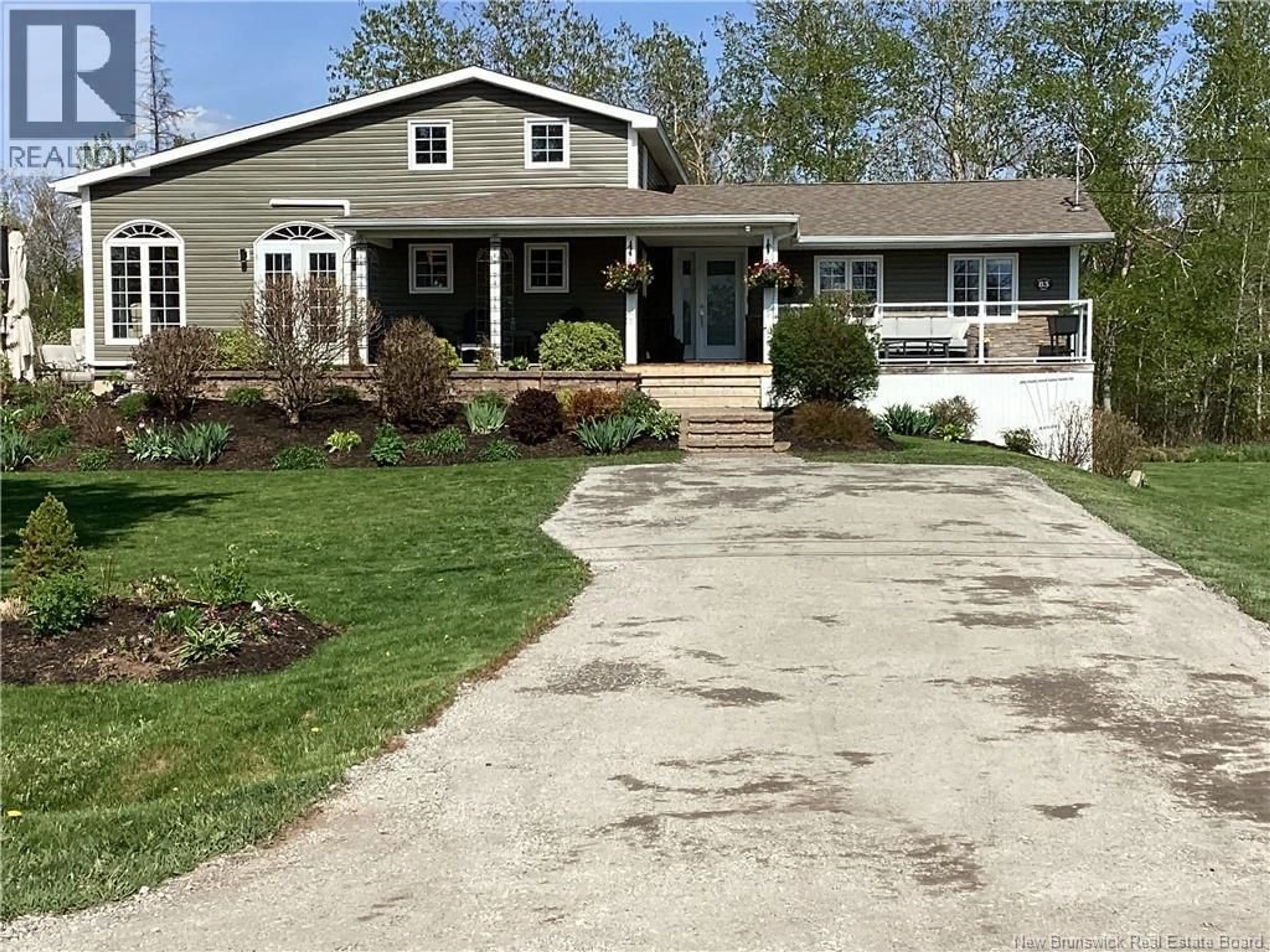 Home with vinyl exterior material, street for 83 BEAU-RIVAGE STREET, Cap-Pelé New Brunswick E4M1M5