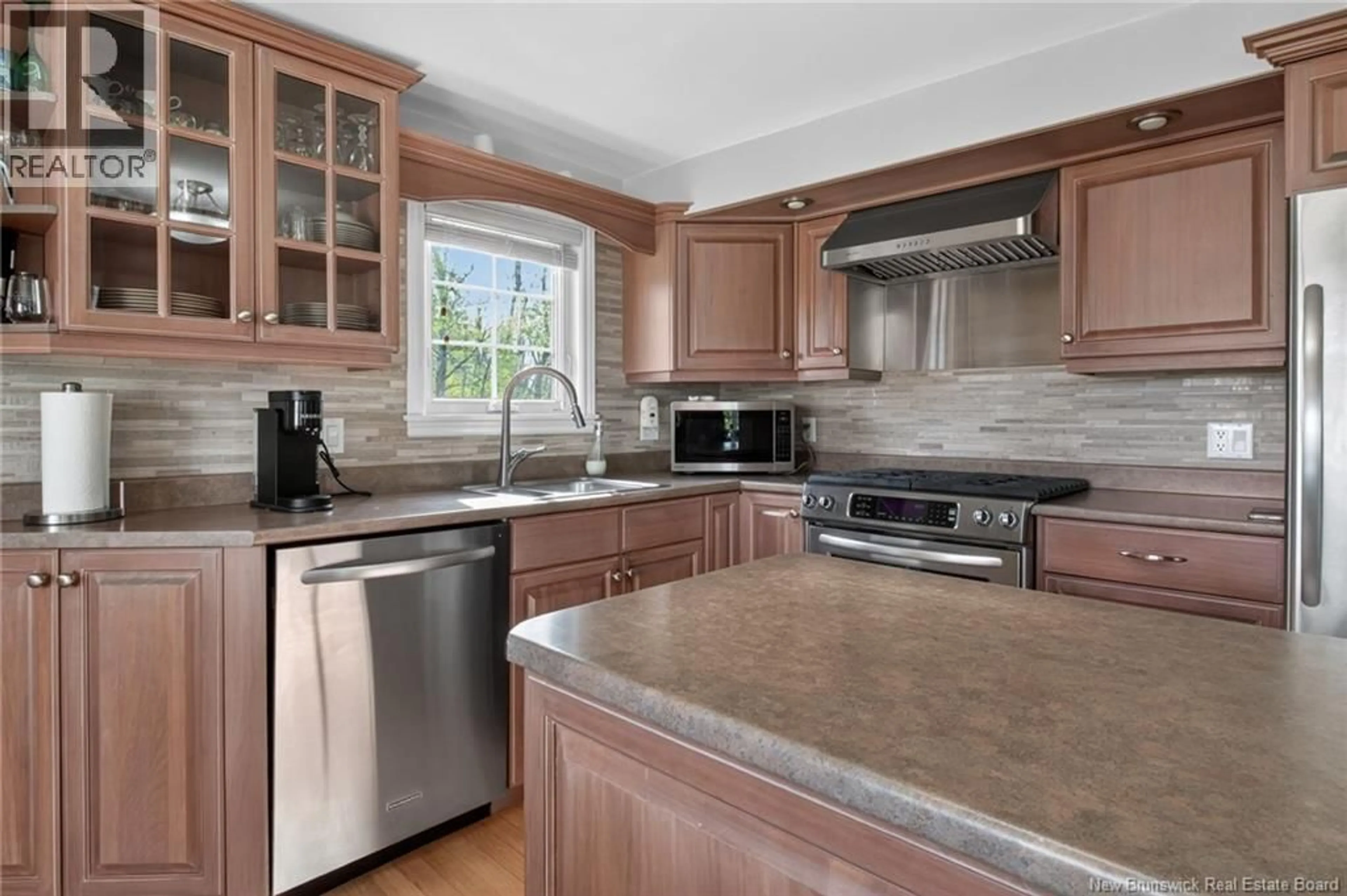 Open concept kitchen, ceramic/tile floor for 83 BEAU-RIVAGE STREET, Cap-Pelé New Brunswick E4M1M5