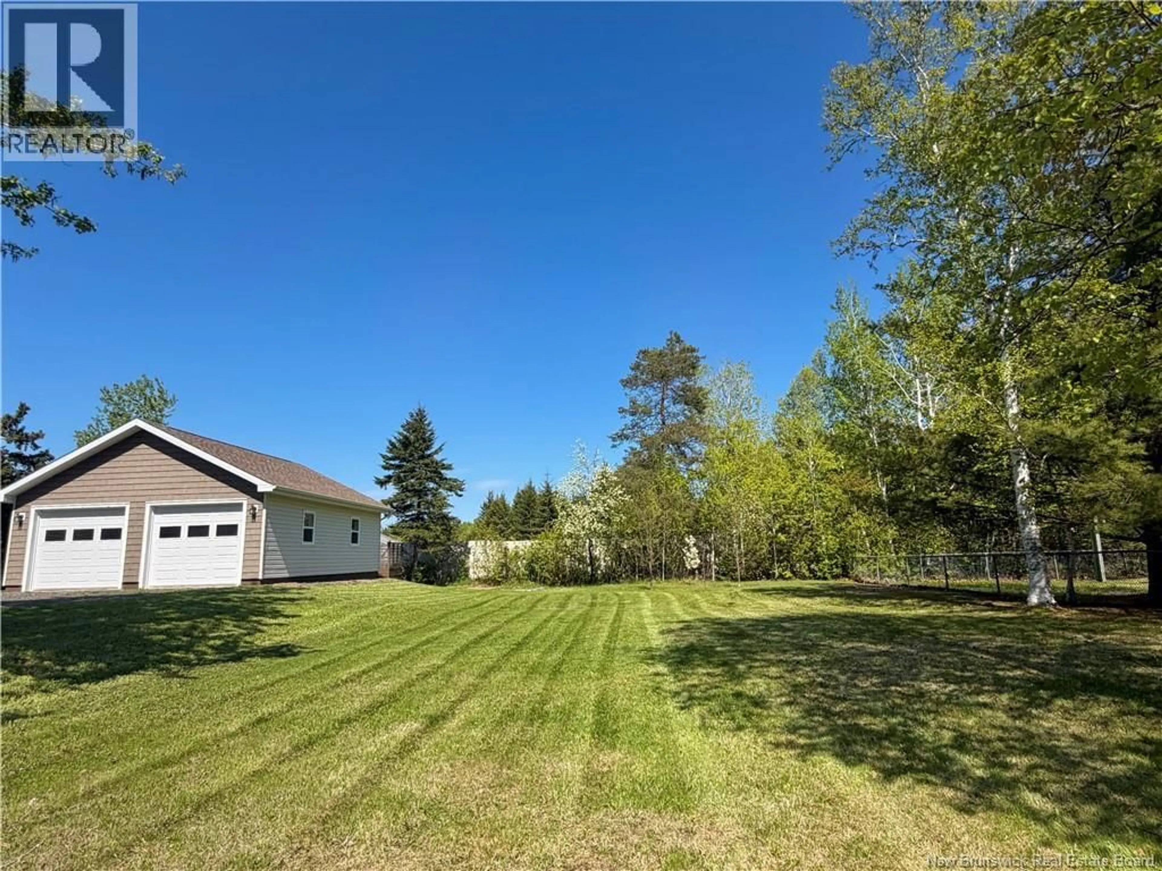 A pic from outside/outdoor area/front of a property/back of a property/a pic from drone, water/lake/river/ocean view for 393 RUE DES ÉRABLES, Nigadoo New Brunswick E8K3M1