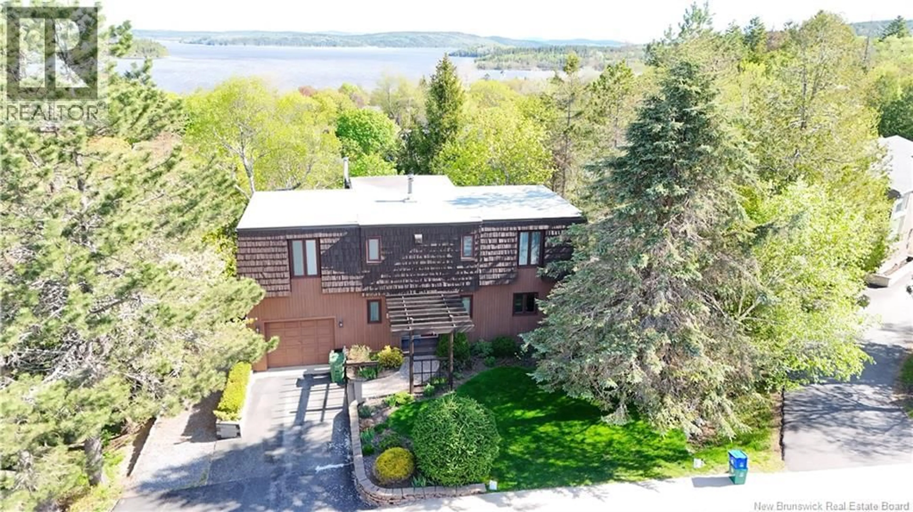 A pic from outside/outdoor area/front of a property/back of a property/a pic from drone, water/lake/river/ocean view for 9 MARLIN TERRACE, Saint John New Brunswick E2K4H6