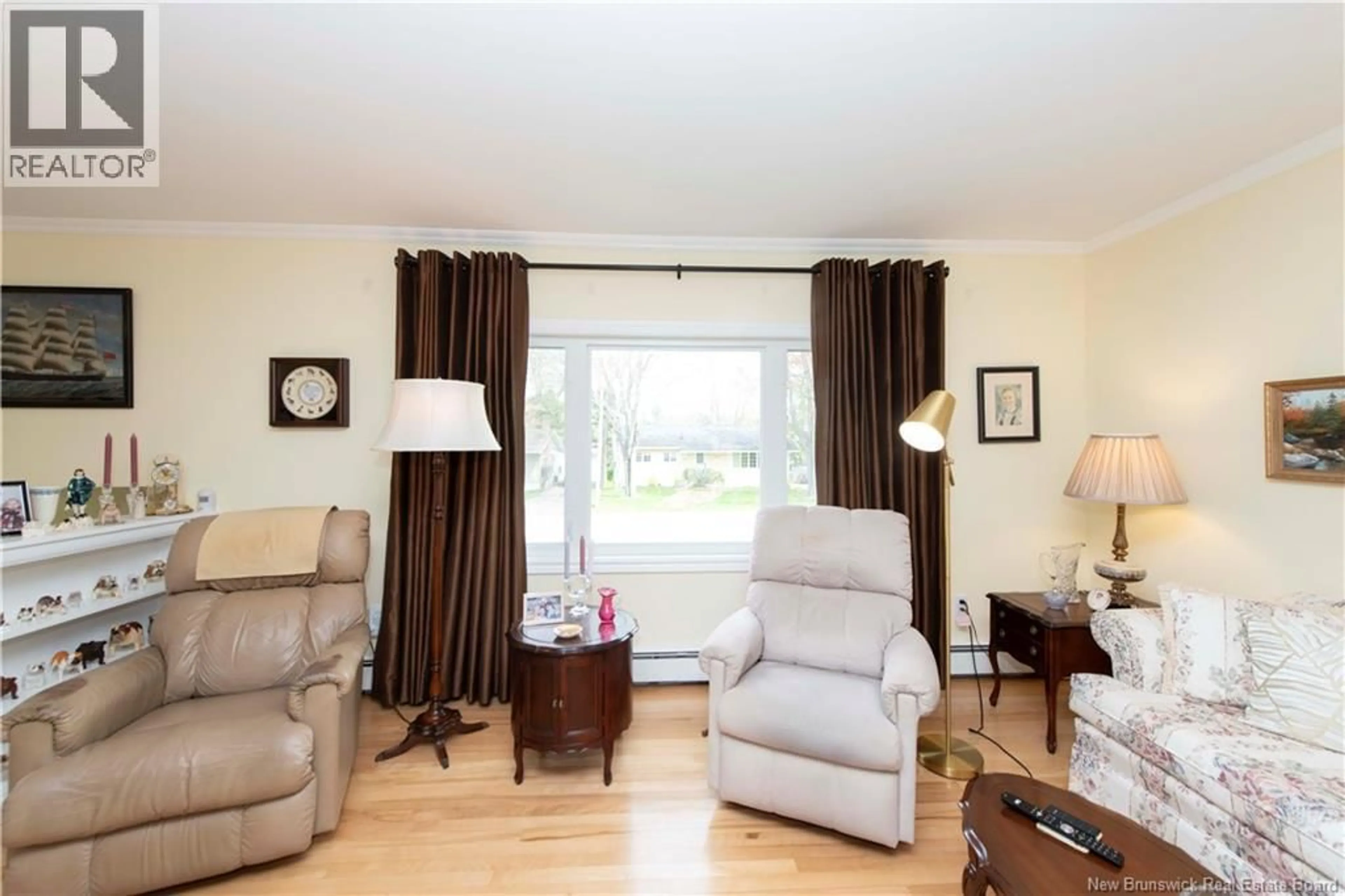 Living room with furniture, wood/laminate floor for 310 BEVERLY CRESCENT, Riverview New Brunswick E1B3B6
