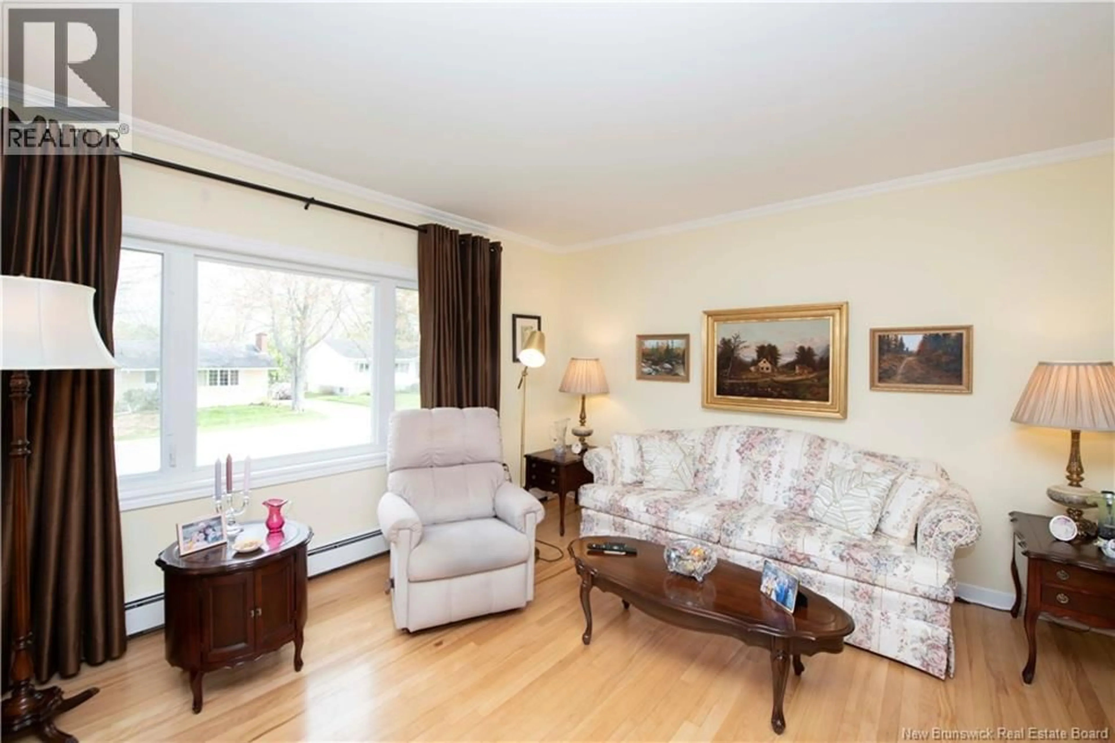 Living room with furniture, wood/laminate floor for 310 BEVERLY CRESCENT, Riverview New Brunswick E1B3B6