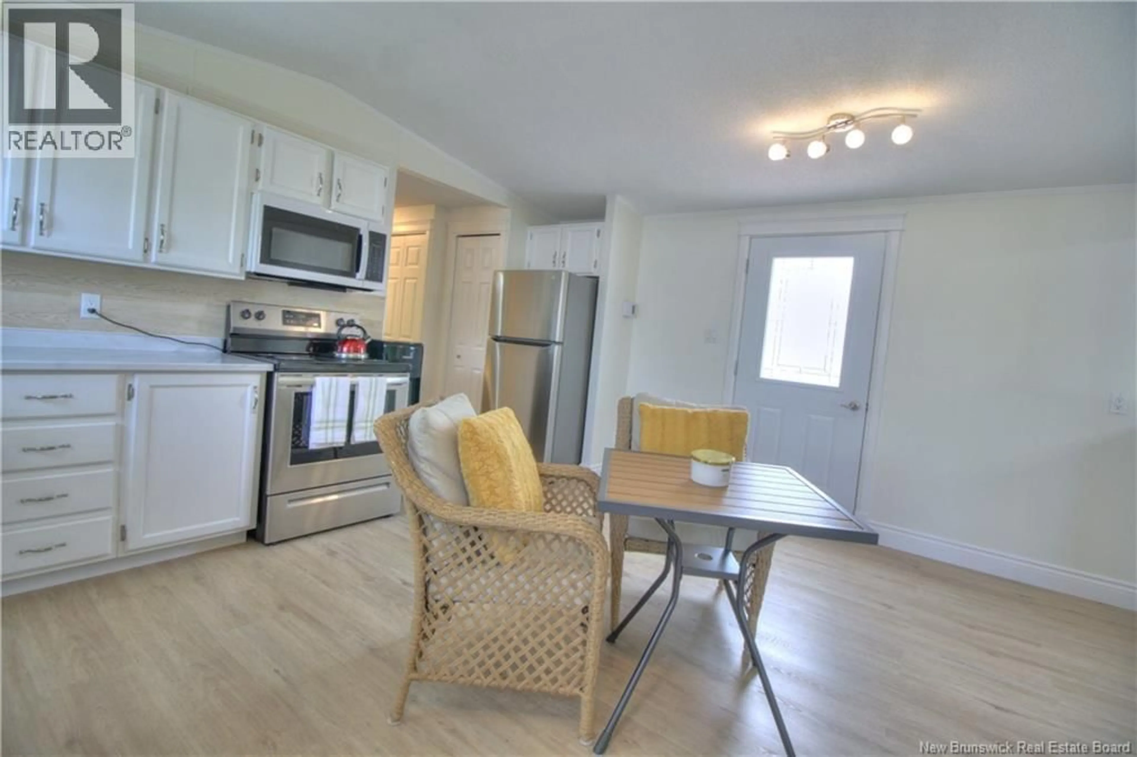 Open concept kitchen, wood/laminate floor for 1 JASPER, Moncton New Brunswick E1H2X6